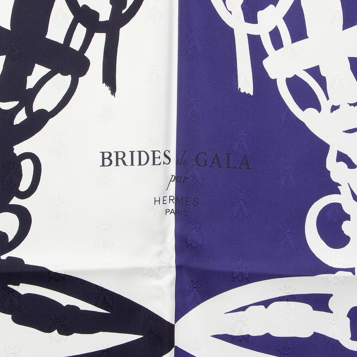 Hermes 'Brides de Gala Quadri Tattoo 90' scarf by Hugy Grykar in white, ink and midnight blue silk (100%) with bee jacquard and contrast ink blue hem. Brand new.

Width 90cm (35.1in)
Height 90cm (35.1in)