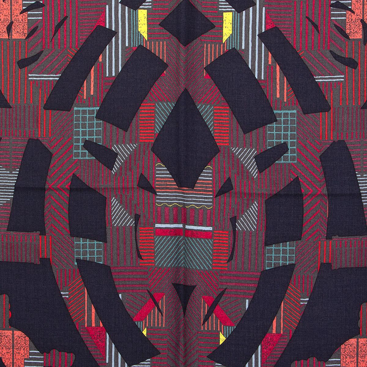Hermes 'Cavalcadour 140' shalw by Henri d'Origny in midnight blue and teal cashmere (70%) and silk (30%) with contrast midnight blue hem with details in raspberry, grey, coral and red. Brand new. No Box.

Width 140cm (54.6in)
Height 140cm (54.6in)