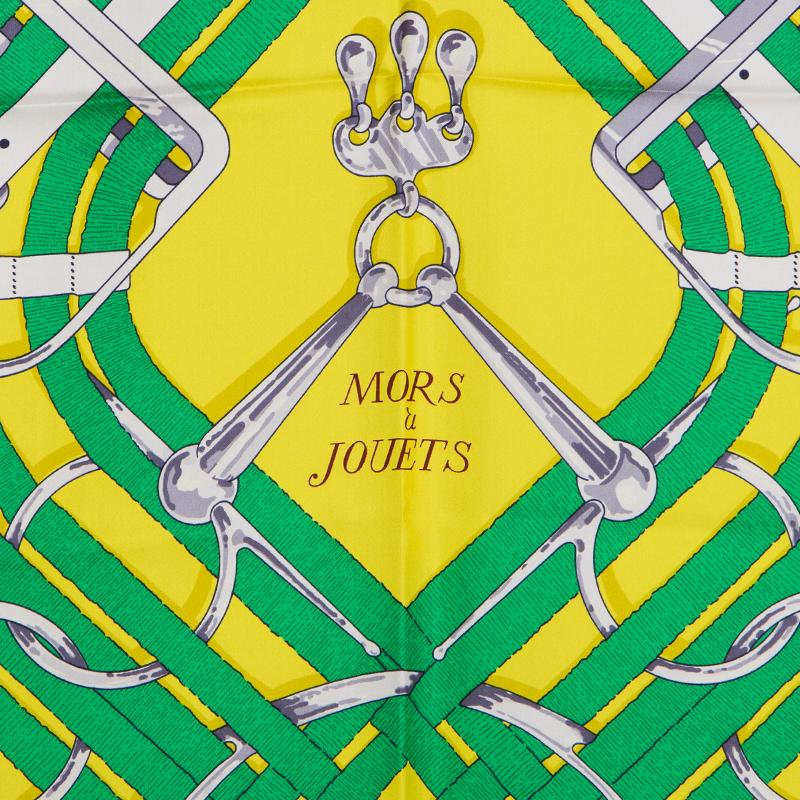 Hermes 'Mors a Jouets 140' shawl Henri d'Origny in royal blue silk twill (100%) with backgraound in yellow and pink and detail in green, grey and navy blue. Brand new.

Width 140cm (55in)
Height 140cm (55in)