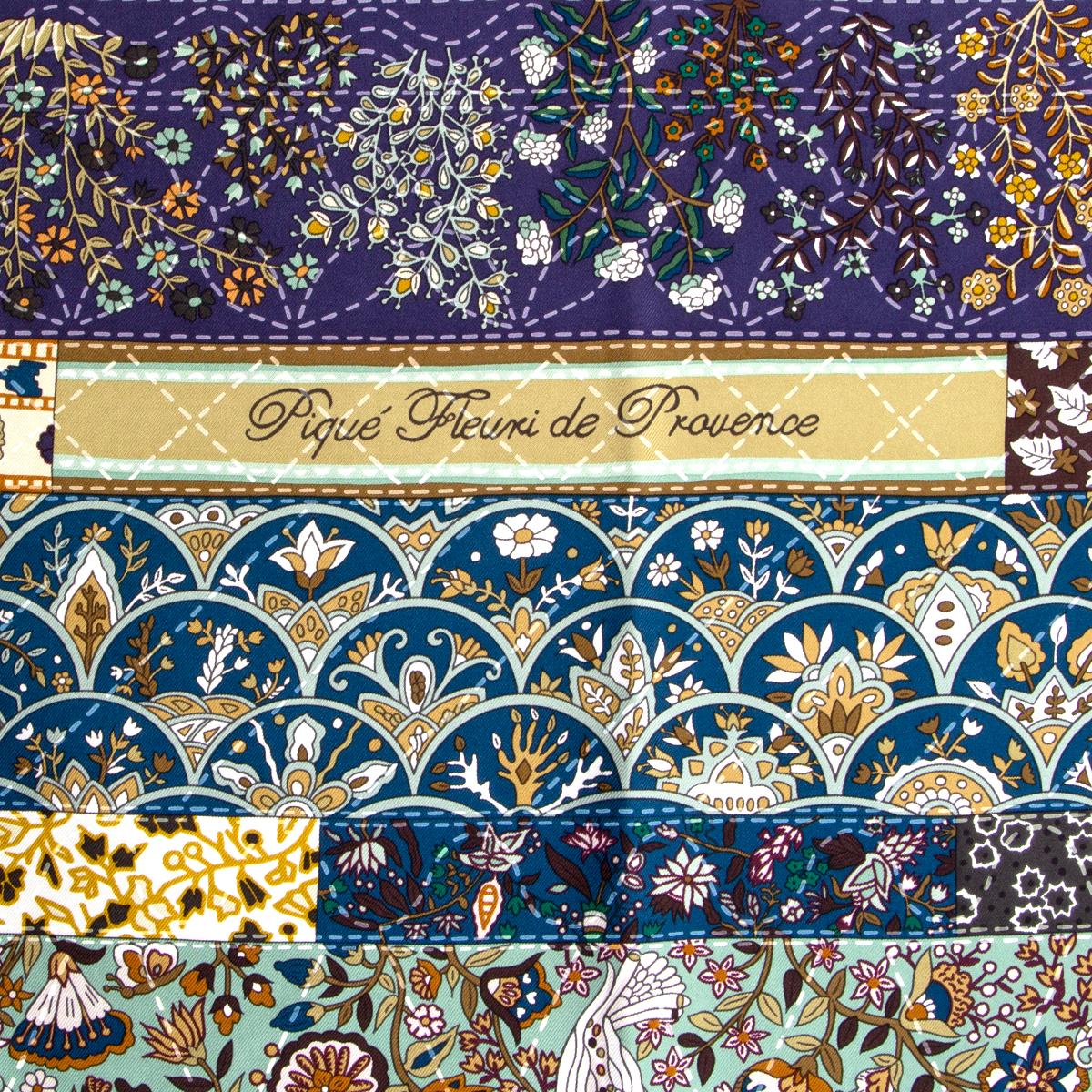 Hermes 'Pique Fleuri de Provence 90' scarf by Christine Henry in purple silk twill (100%) with eggplant border and details in mint green, petrol blue and white. Has been worn and is in excellent condition.

Width 90cm (35.1in)
Height 90cm (35.1in)
