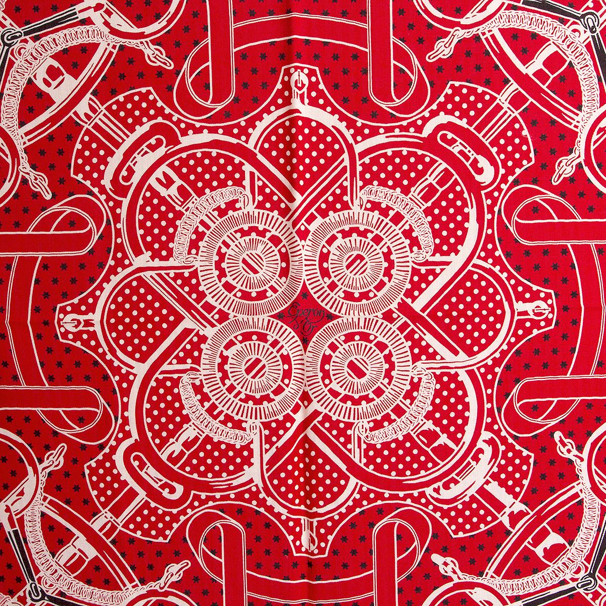 Hermes 'Eperon d'Or 140' shawl by Henri d'Origny in red cashmere (70%) and silk (30%) with details in black and white. Brand new. No Box.

Width 140cm (54.6in)
Height 140cm (54.6in)