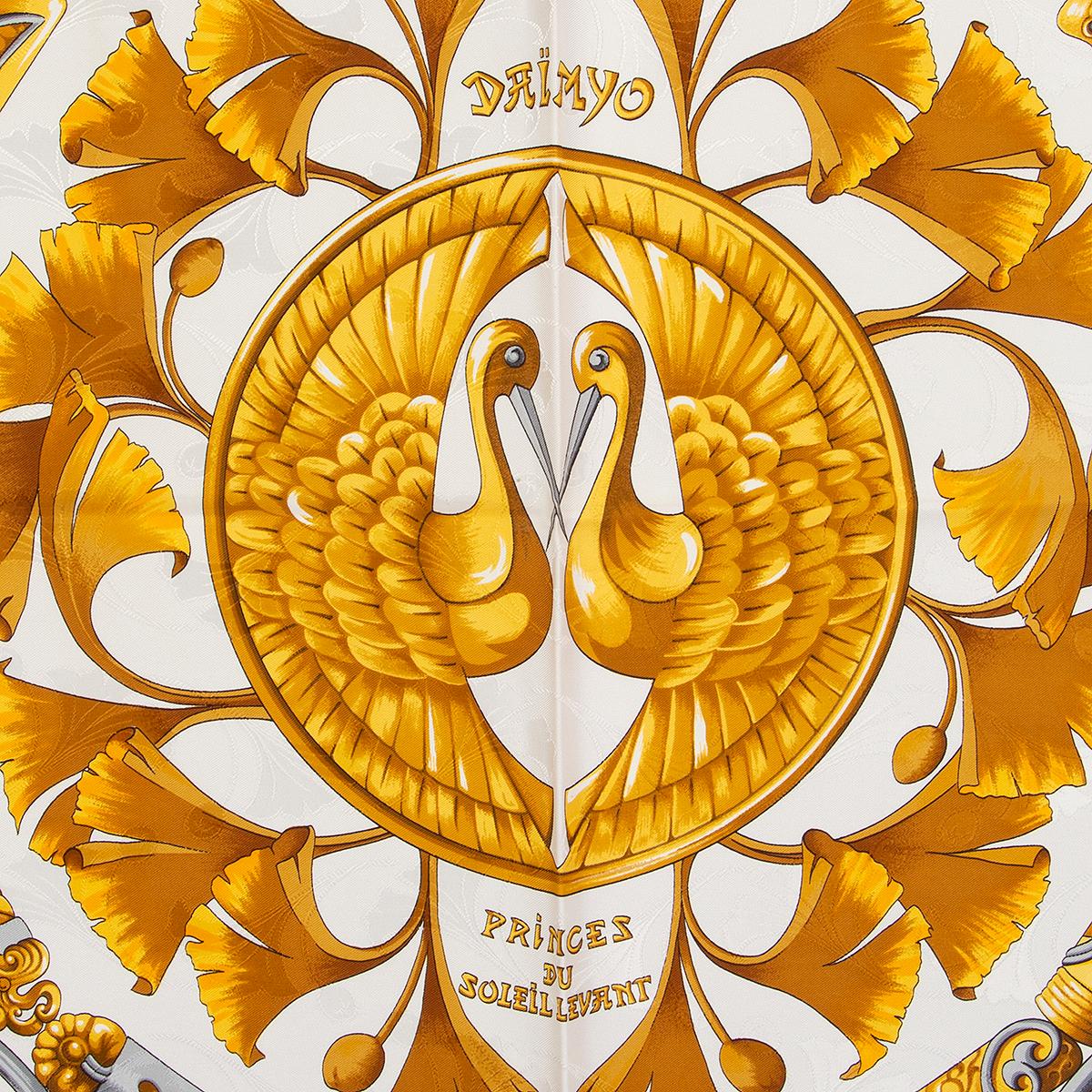 Hermes 'Daimyo Princes du Soleil Levant 90' scarf by Francoise Faconnet in white silk jacquard (100%) with details in gold. Has been worn and is in excellent condition.

Width 90cm (35.1in)
Height 90cm (35.1in)