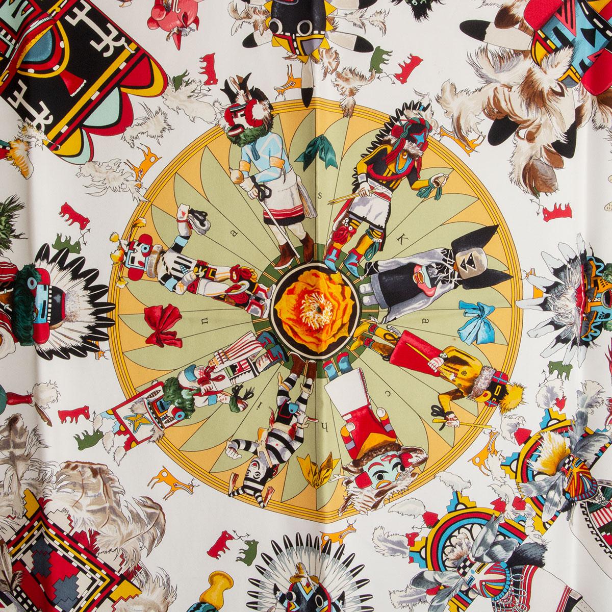 Hermes 'Kachinas 90' scarf by Kermit Oliver in yellow, sage green and white silk twill (100%) with kelly green border and multicolor details. Has been worn and is in excellent condition.

Kermit Oliver is the only American scarf designer for Hermes