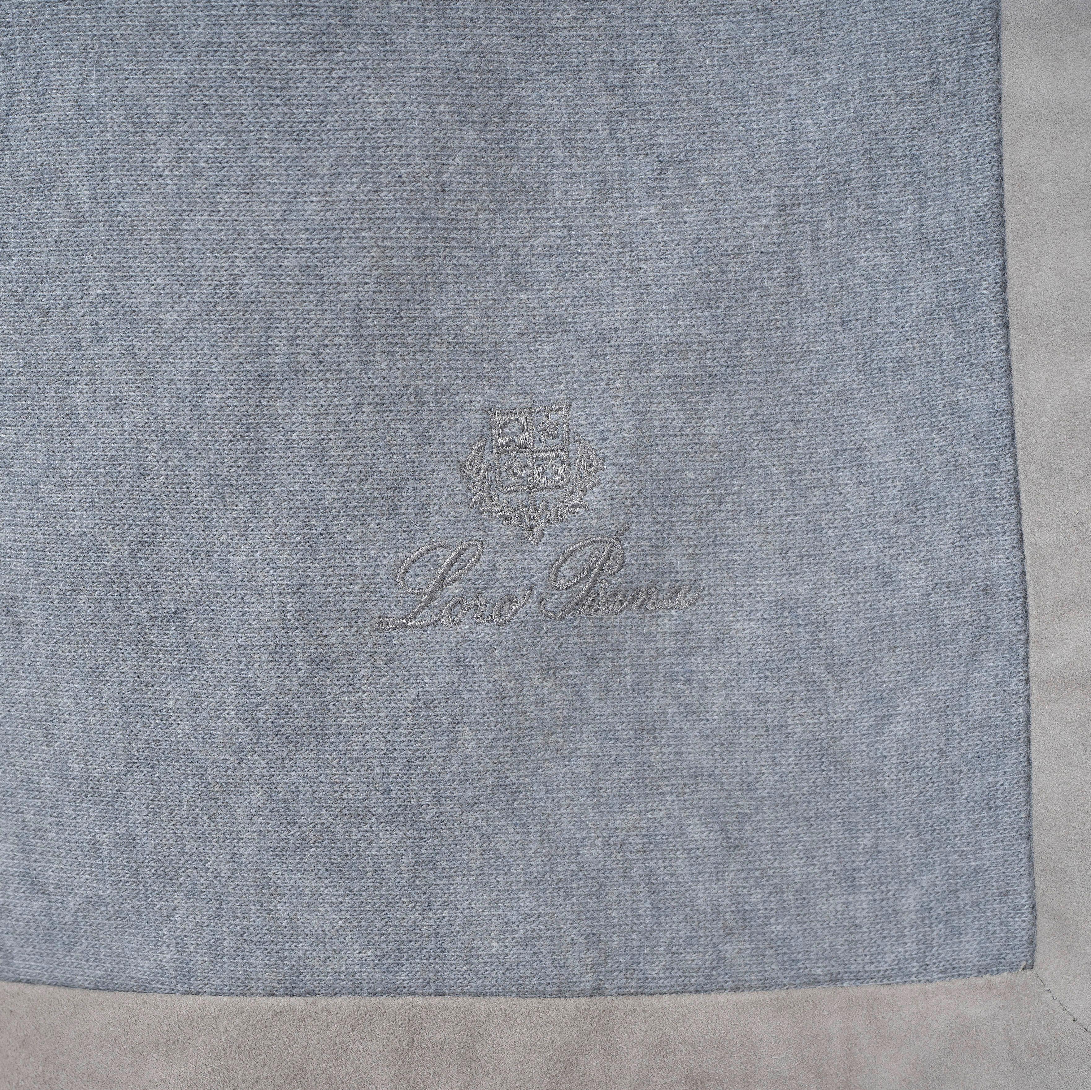 100% authentic Loro Piana blanket in mélange grey jersey baby cashmere (95%) and nylon (5%) with light grey suede border. Has been used and is in excellent condition.

Measurements
Width	115cm (44.9in)
Length	150cm (58.5in)

All our listings include
