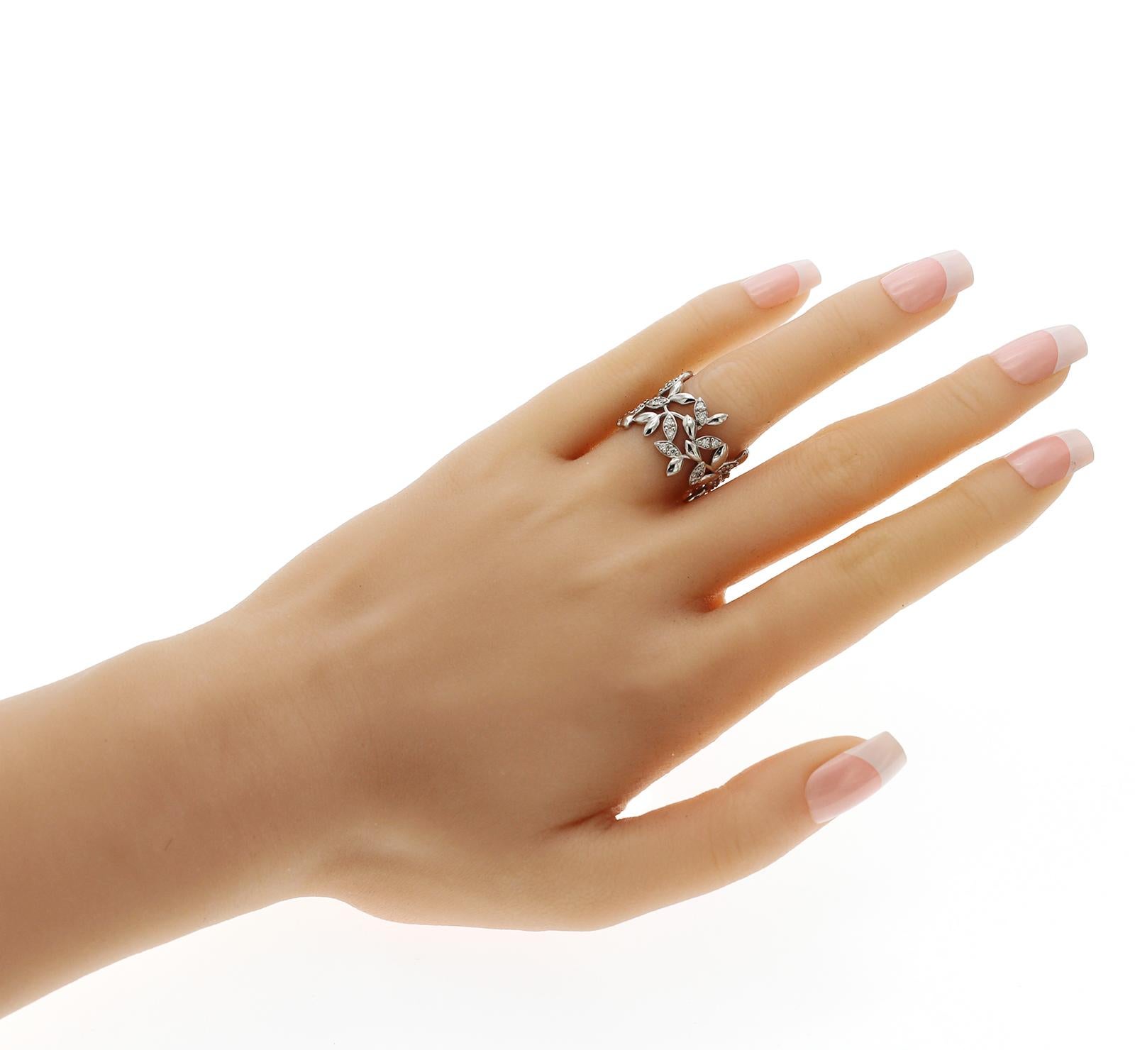 100% Authentic, 100% Customer Satisfaction

Height: 17 mm

Band Width: 17 mm

Size: 7 

Metal:18K White Gold

Hallmarks: Tiffany & Co, 750

Total Weight: 7.9 Grams

Stone Type: Diamond

Condition: Pre Owned

Estimated Price: $6200

Stock Number: U319