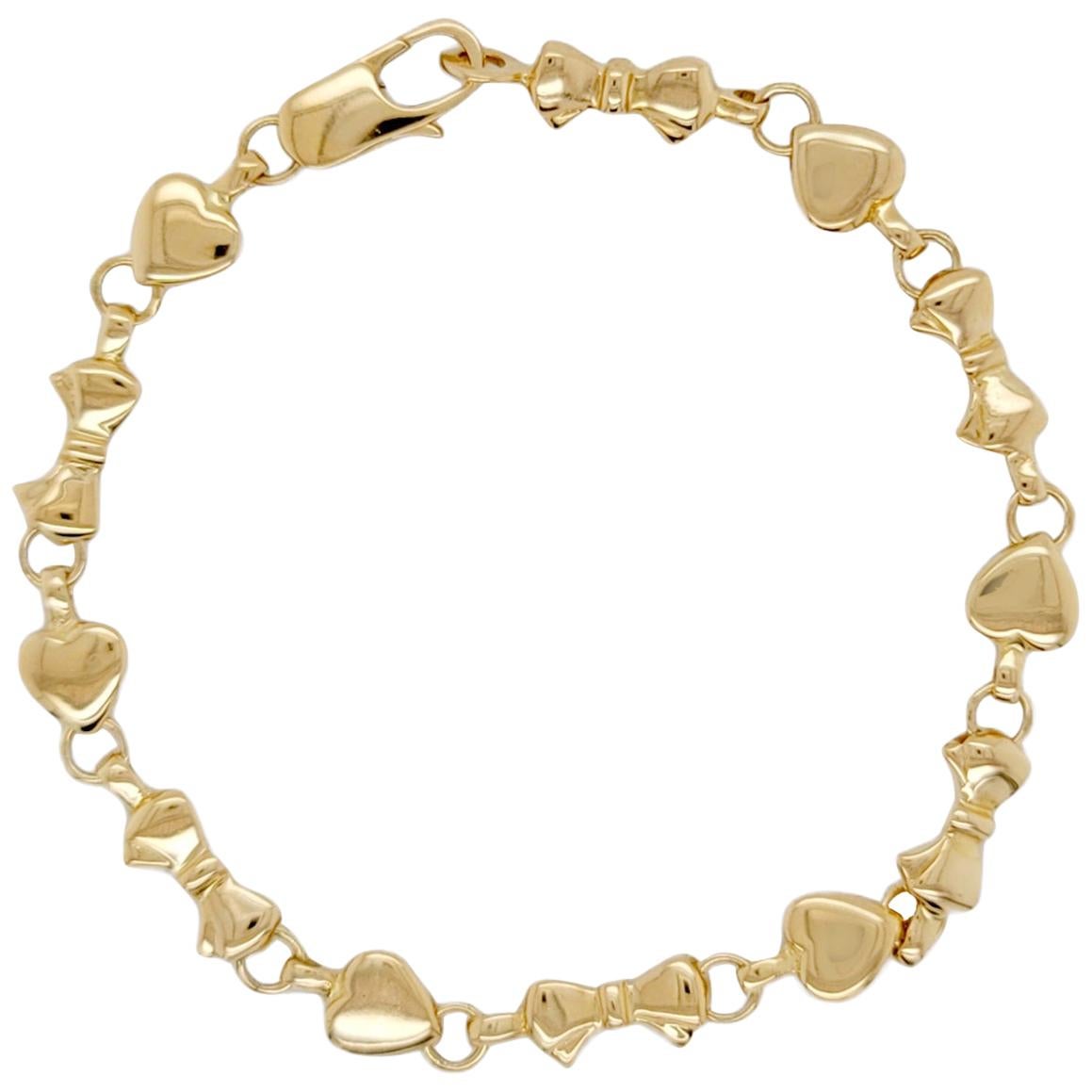 Auth Tiffany & Co. 18K Yellow Gold Heart and Bow Tie Bracelet