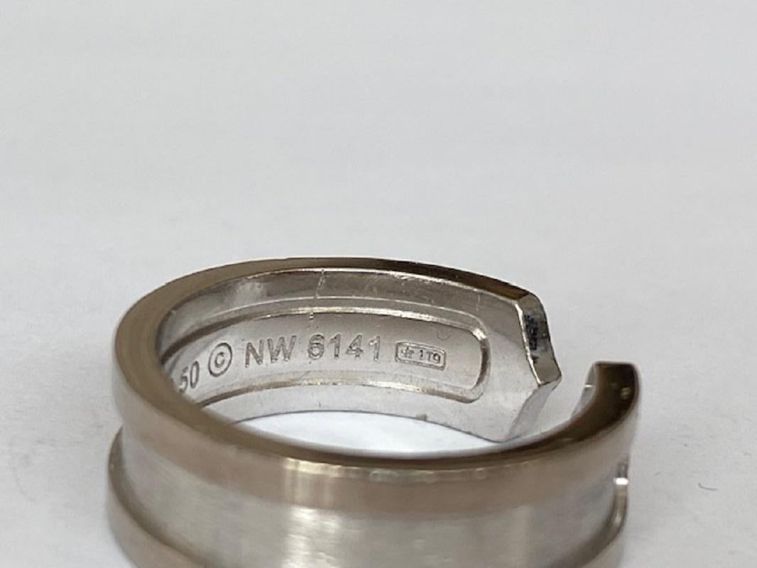 Authentic 18 kt white gold 