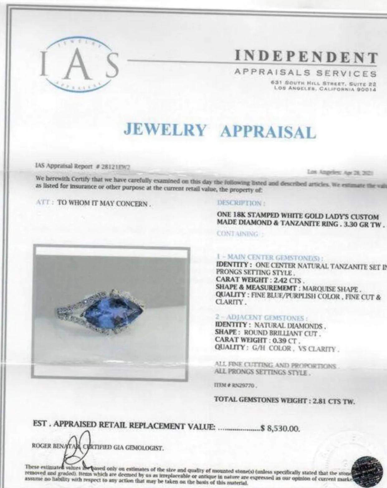 Authentic 18k 2.42 Ct Tanzanite & .39 Ct Diamond Ring with Appraisal Report Inc In Excellent Condition For Sale In Perry, FL