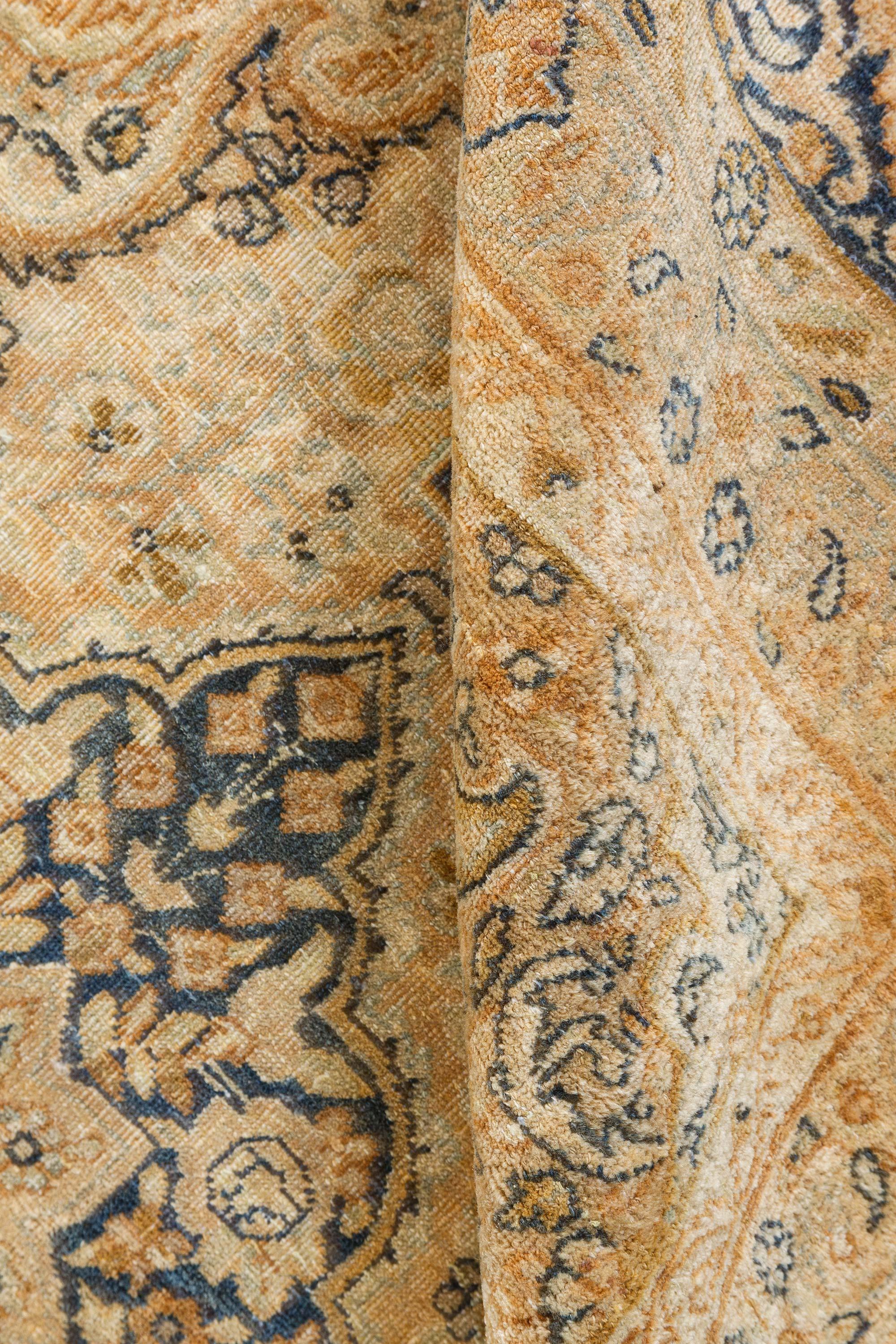 Authentic 1900s Persian Tabriz handmade wool carpet
Size: 13'8