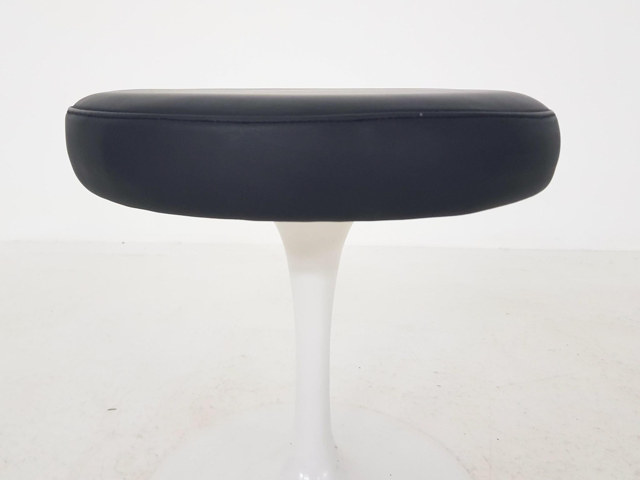 An original and vintage dark blue leather Eero Saarinen swivel tulip stool for Knoll International, 1969.

This is an authentic stool from Eero Saarinen for Knoll International. This stool was once used in the city hall wedding room of Eindhoven the