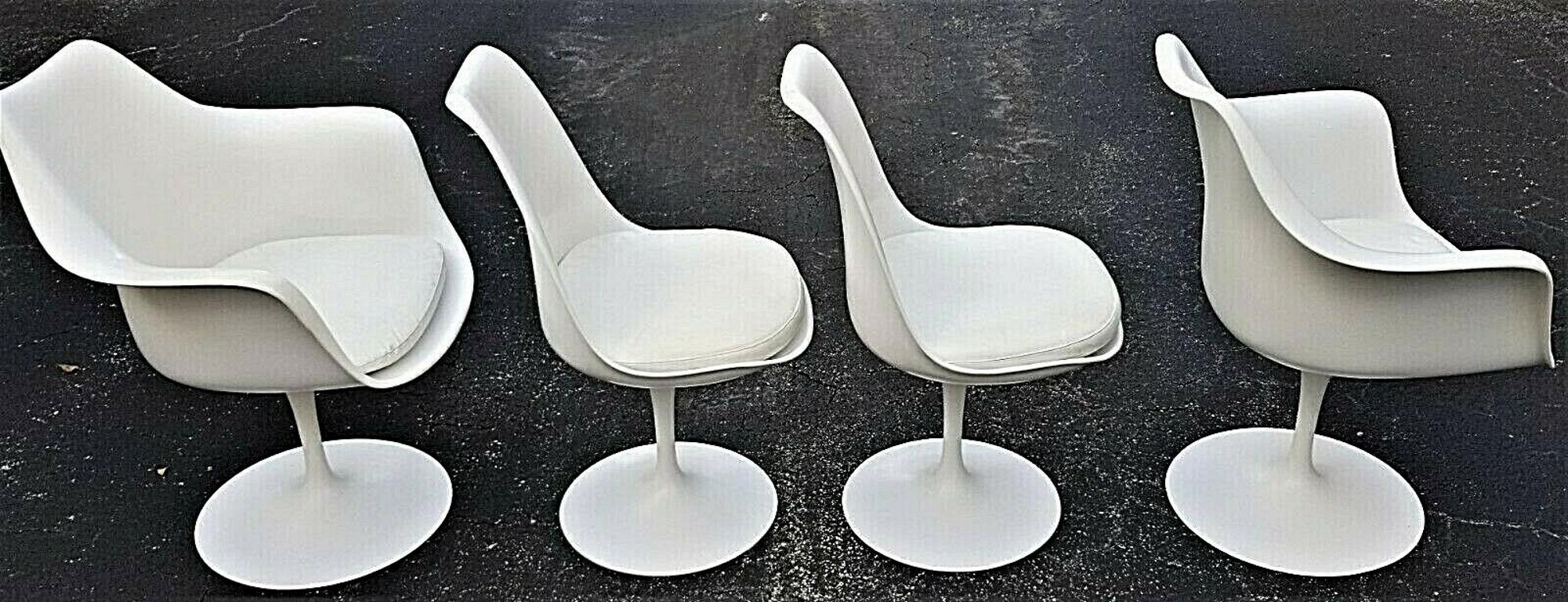 Offering One Of Our Recent Palm Beach Estate Fine Furniture Acquisitions Of An
Authentic 1970's KNOLL EERO SAARINEN Tulip Swivel Dining Chairs - Set of 4

This listing and price are for the 4 chairs only. We also have the matching table available