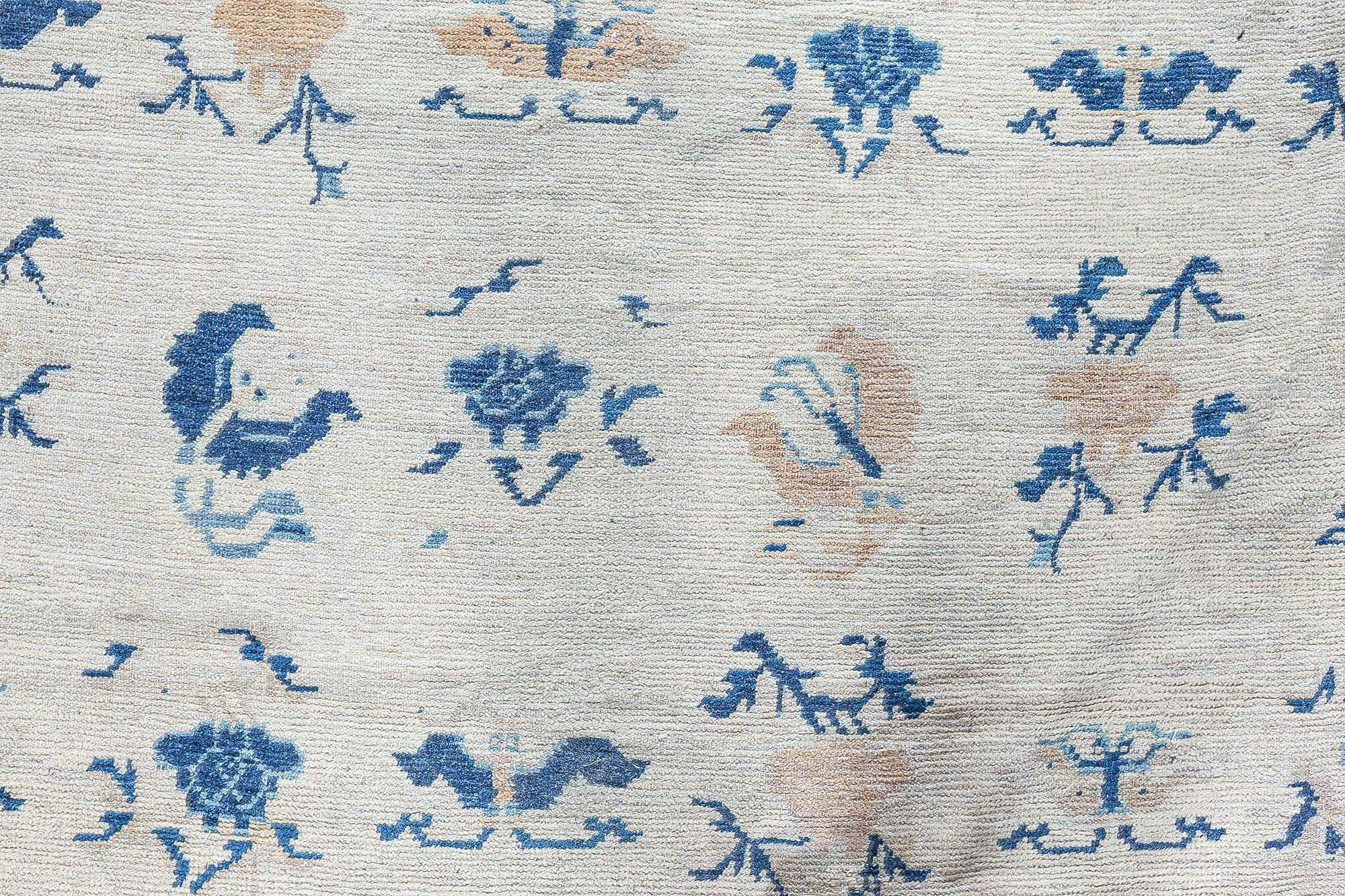 Authentic 19th Century Chinese Botanic Wool Rug
Size: 12'4