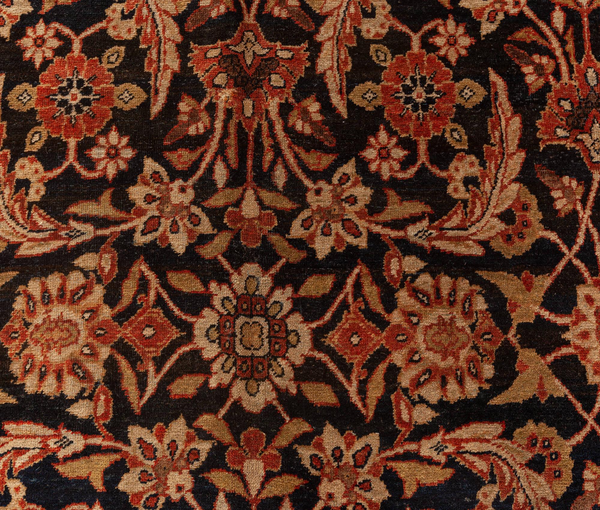 Authentic 19th century Persian Kirman botanic handmade wool rug
Size: 9'2