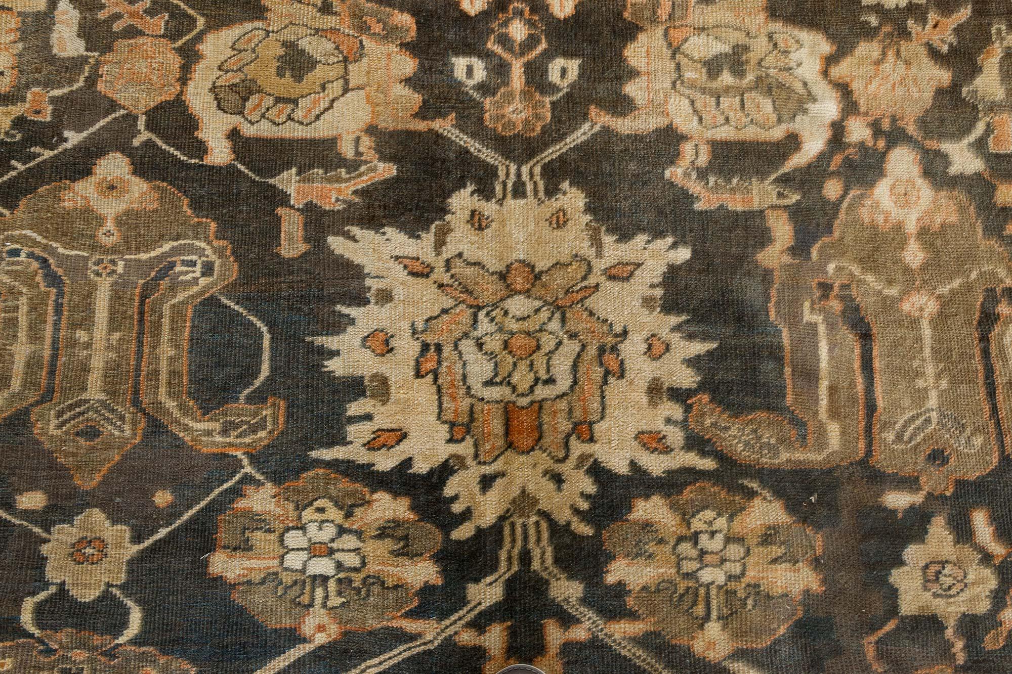 19th century Persian Sultanabad handmade wool rug
Size: 11'8