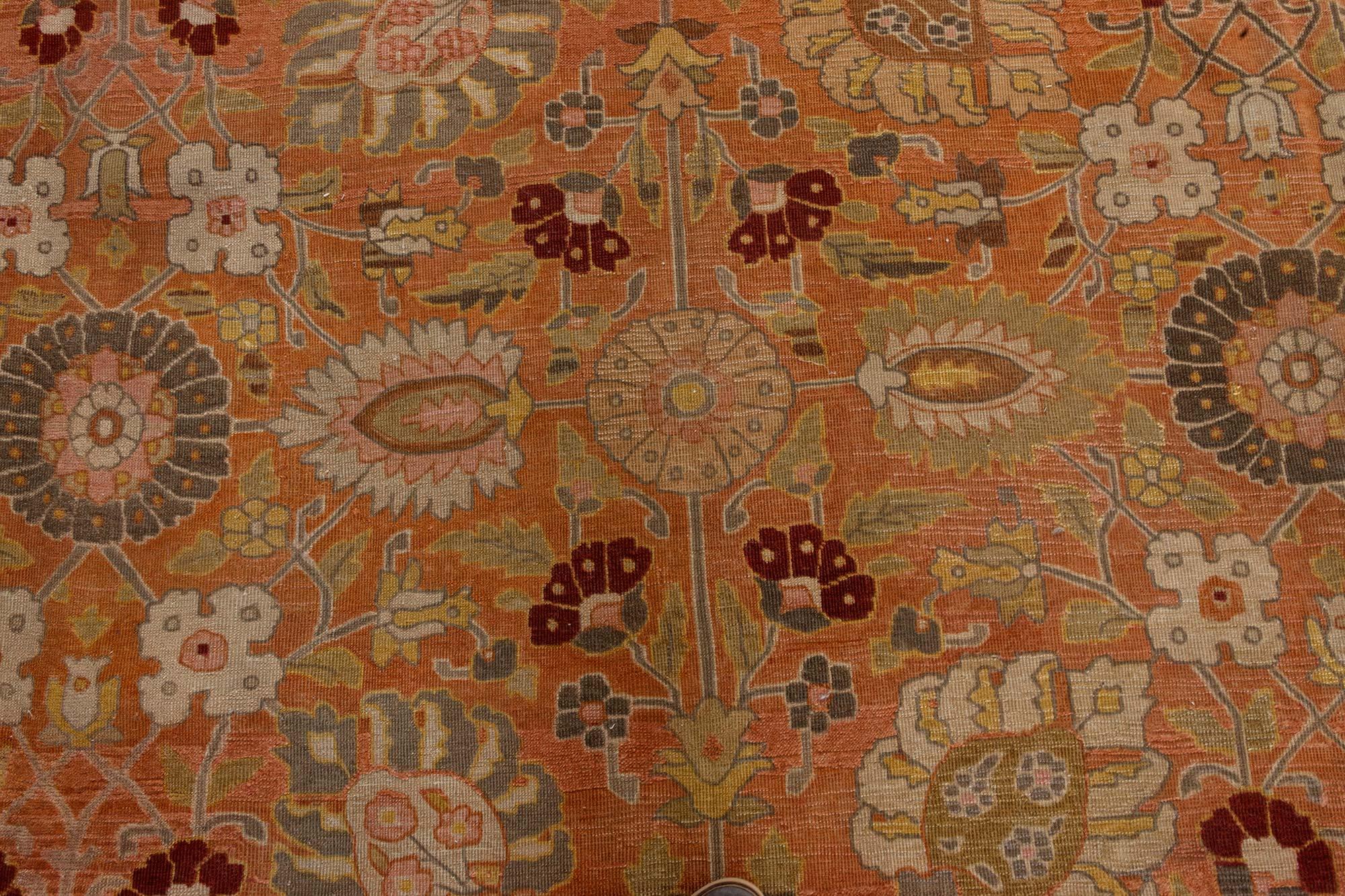 Authentic 19th century Persian Tabriz handmade wool rug
Size: 12'10