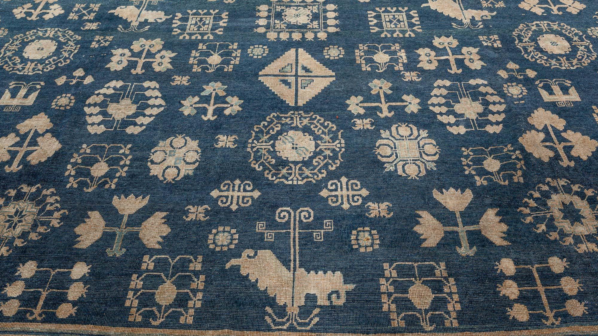 Authentic 19th Century Yarkand handmade wool rug
Size: 11'1