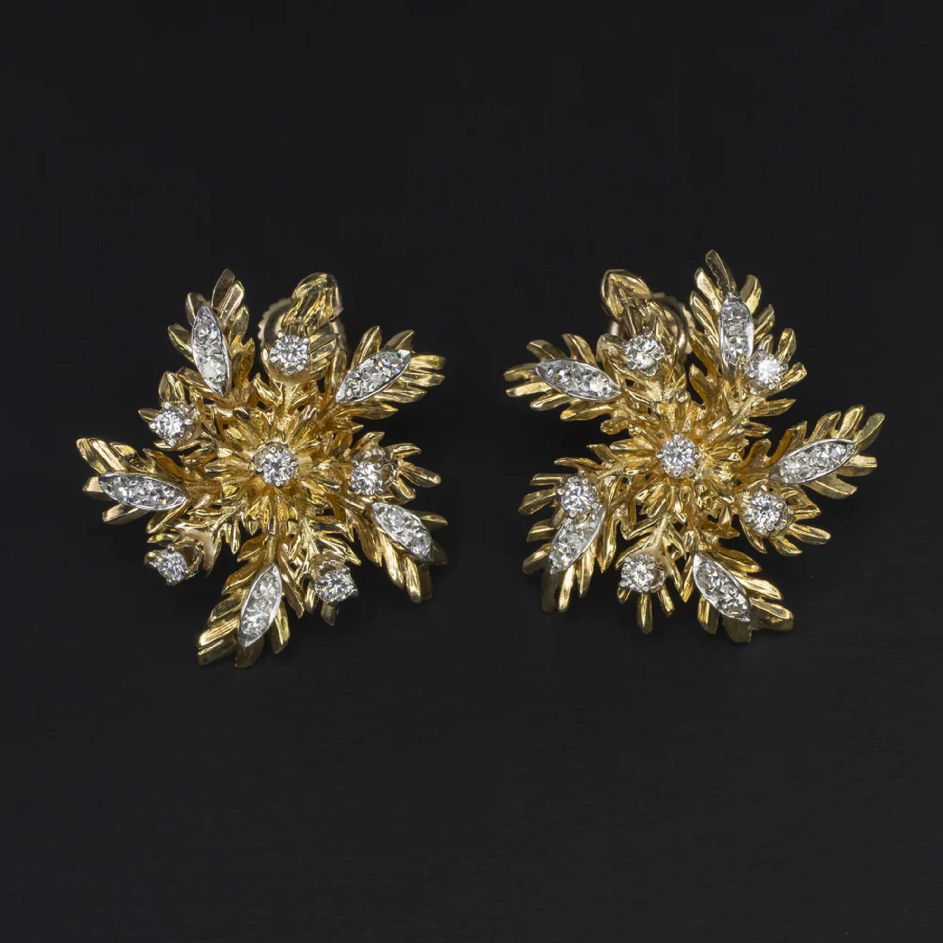 These vintage diamond and 14k yellow gold earrings were handmade during the mid century. They are beautifully crafted with a twirling spray of leaves embellished with bright and vibrant diamonds.

Highlights:

- Overall very high quality!

- 0.88ct