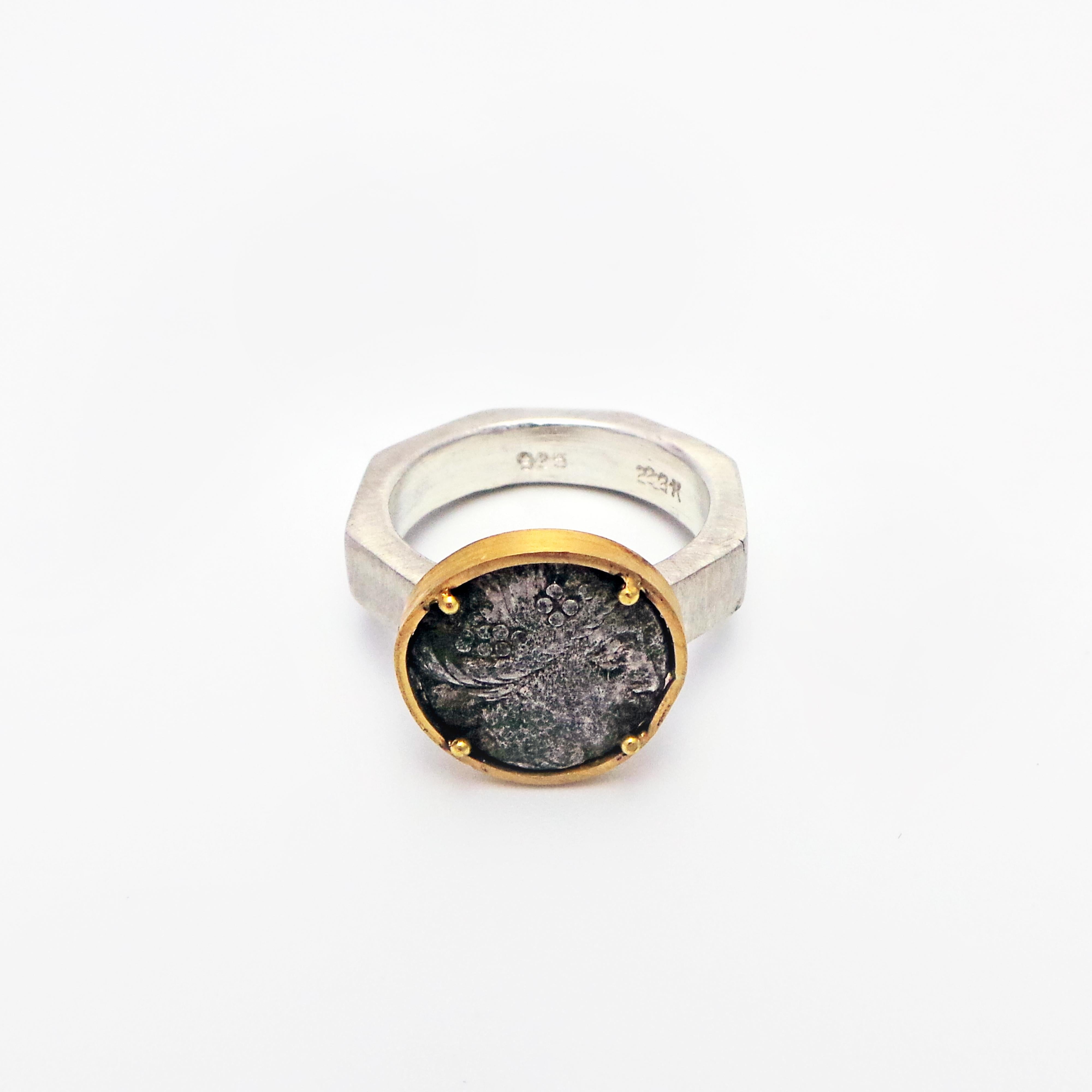Authentic ancient Greek silver coin set in 22k yellow gold and mounted on a brushed/ textured sterling silver octagon shaped ring band. Size 6 1/2. Old world meets modern.
