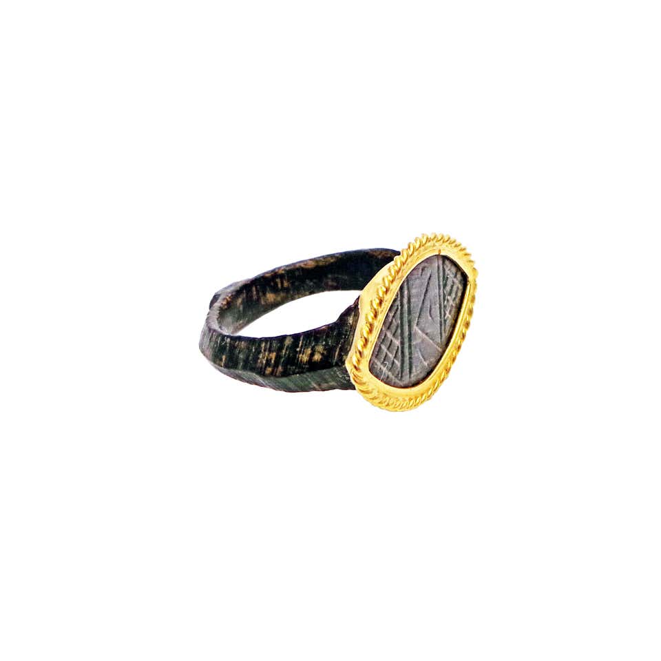 Authentic Ancient Roman Bronze Ring with 22k Gold Bezel at 1stDibs