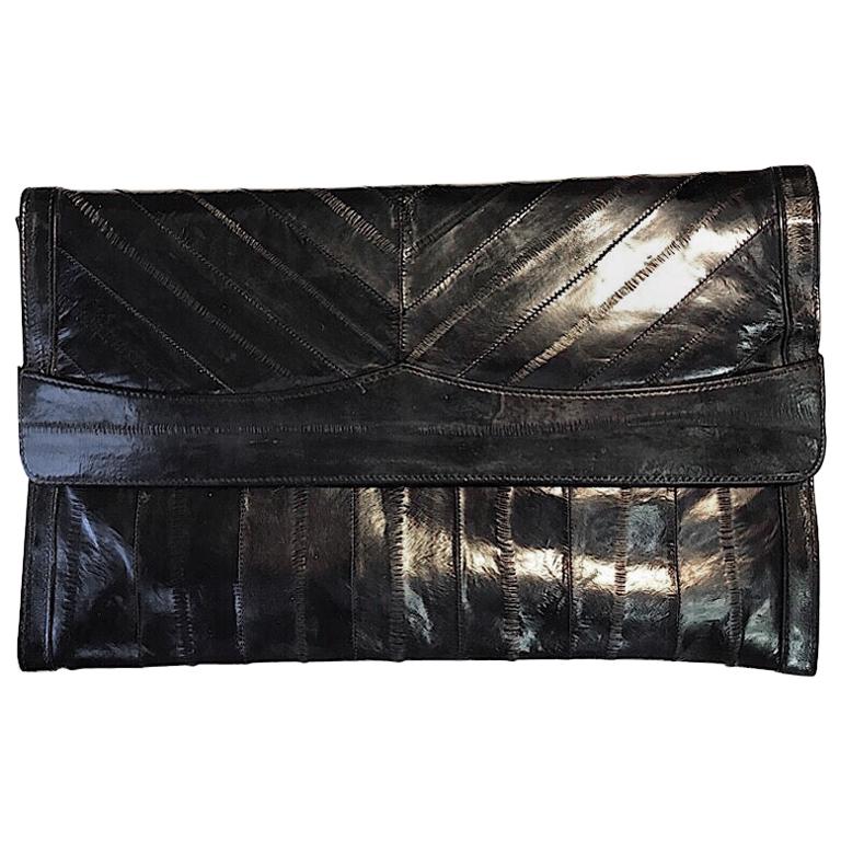 Authentic and Rare Ladies Satin Black Clutch of  Precision Sewn Sections of Eel  For Sale