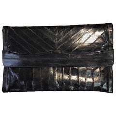 Authentic and Rare Ladies Satin Black Clutch of  Precision Sewn Sections of Eel 