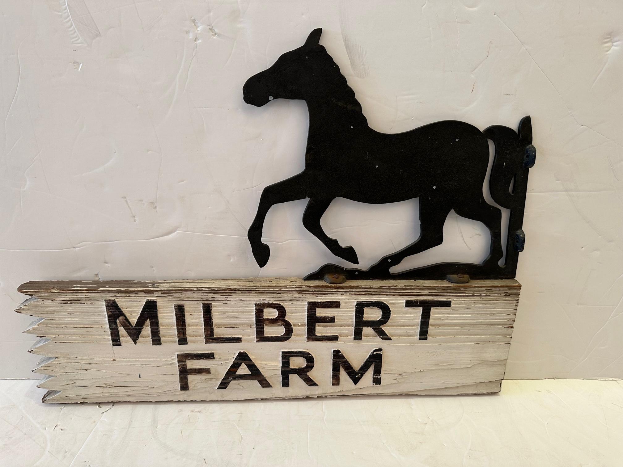 Charming hand made vintage horse farm sign that is finished front and back. The horse and letters are black wrought iron, and the wood has a distressed painted patina.