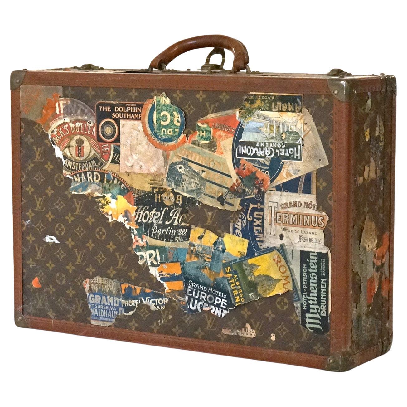 An authentic antique Roaring 20’s Louis Vuitton suitcase belonging to James Owen Mahony (1907-1987) with world travel stickers, c1920

Measures - 17.5