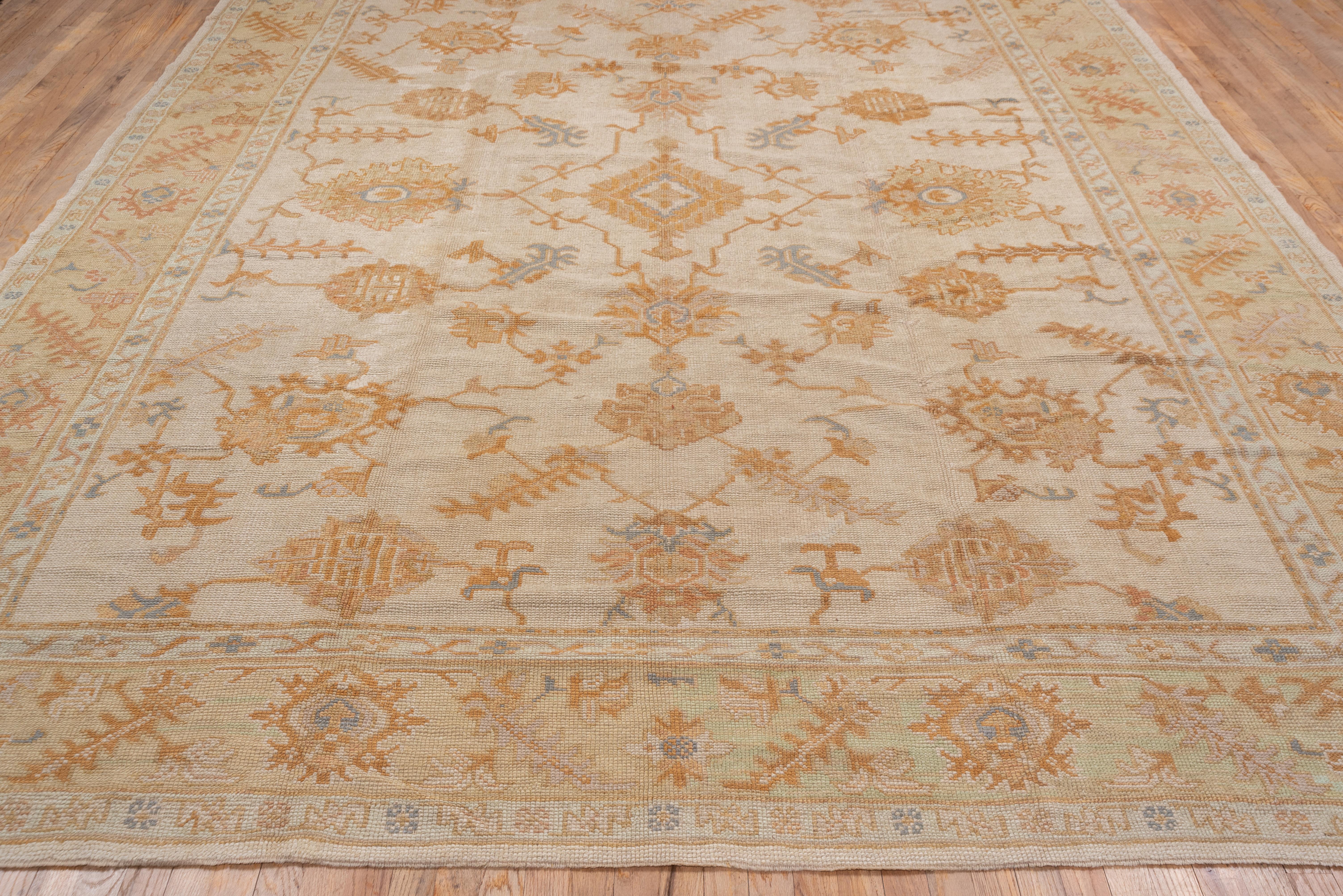 Early 20th Century Authentic Antique Turkish Oushak Rug, Allover Ivory Field, Yellow Borders For Sale