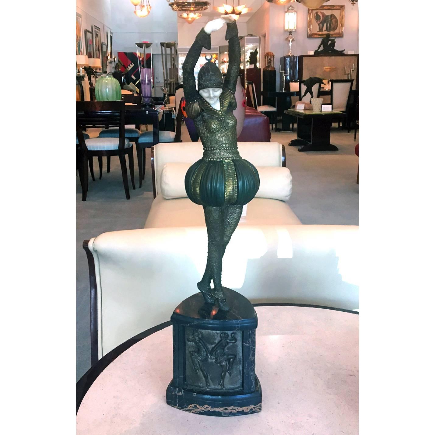 Authentic rare and unique sculpture by the Master of Art Deco Demetre H. Chiparus, this piece is entitled Bayadere and is depicting a female dancer wearing an exotic costume.
Made in France,
circa 1928.
Signature D. H. Chiparus, “Certificate of