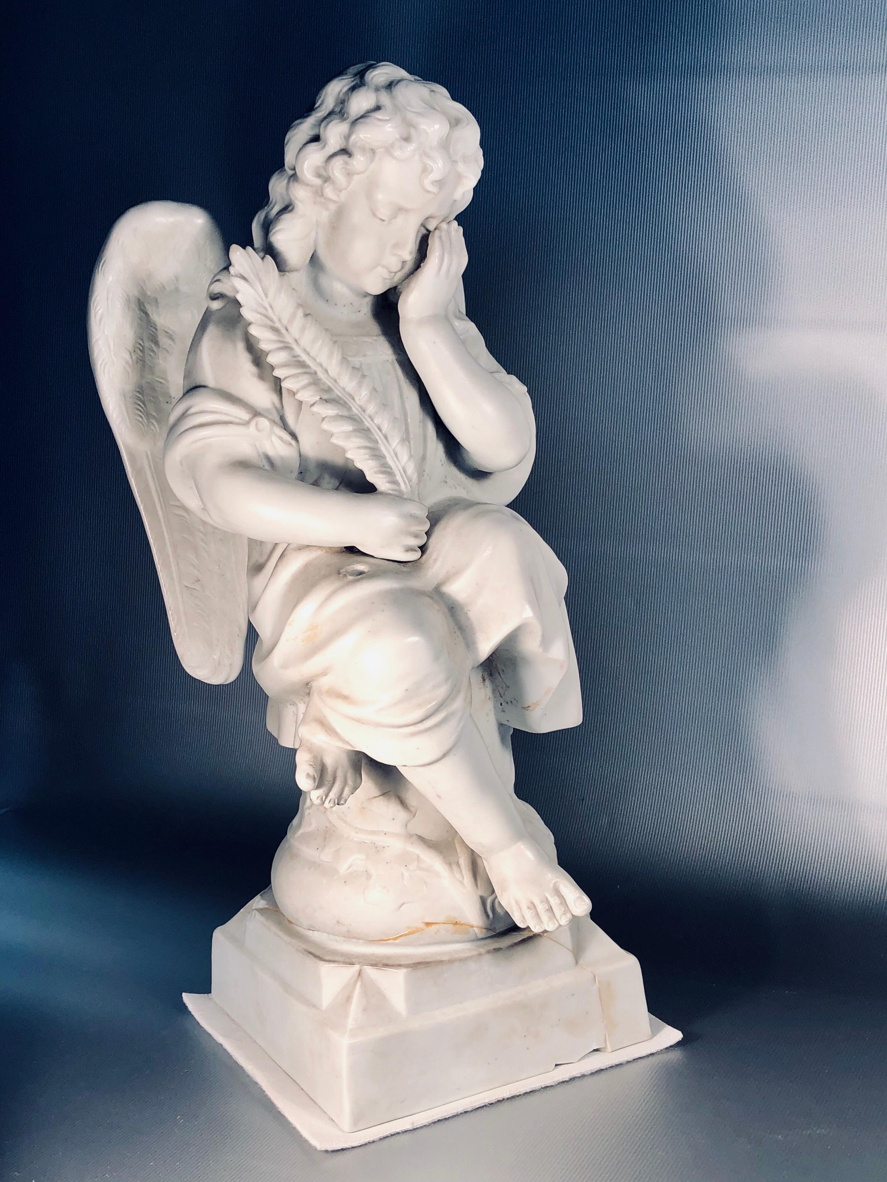 Beautiful angel from real marble, has been the base broken, shown on the photo