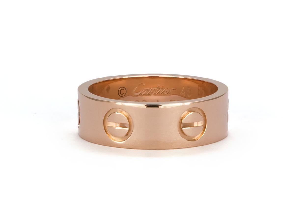 We are pleased to offer this Authentic Cartier 18K Rose Gold Love Ring. The ring was sent to Cartier for service before being put up for sale. It is a size 48 EU/4.5 US and comes with the Cartier service papers, Cartier service/travel pouch and