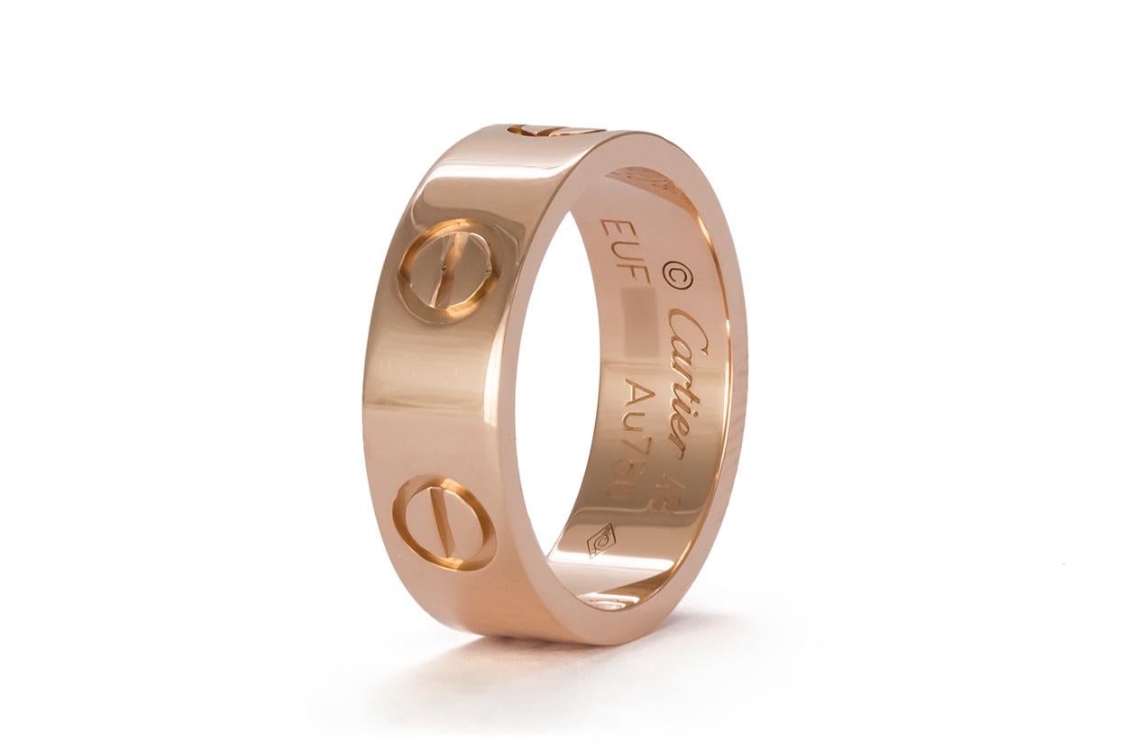 Authentic Cartier 18 Karat Rose Gold Love Ring Serviced by Cartier In Excellent Condition In Tustin, CA
