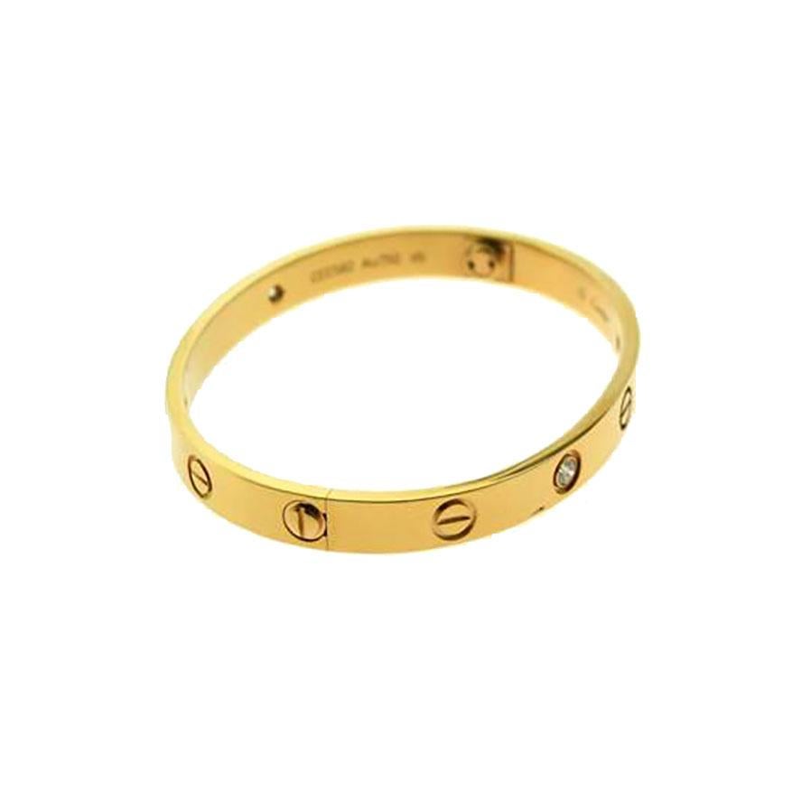 Designer: Cartier

Collection: Love

Style: Bangle Bracelet

Metal: Rose Gold

​​​​​​​Metal Purity: 18k

Stone: Round Brilliant Cut Diamonds

Total Carat Weight: 0.42 ct

Bracelet Size: 16 = 16 cm

Hallmarks: 16, Au750 Cartier, Serial No.,

Retail: