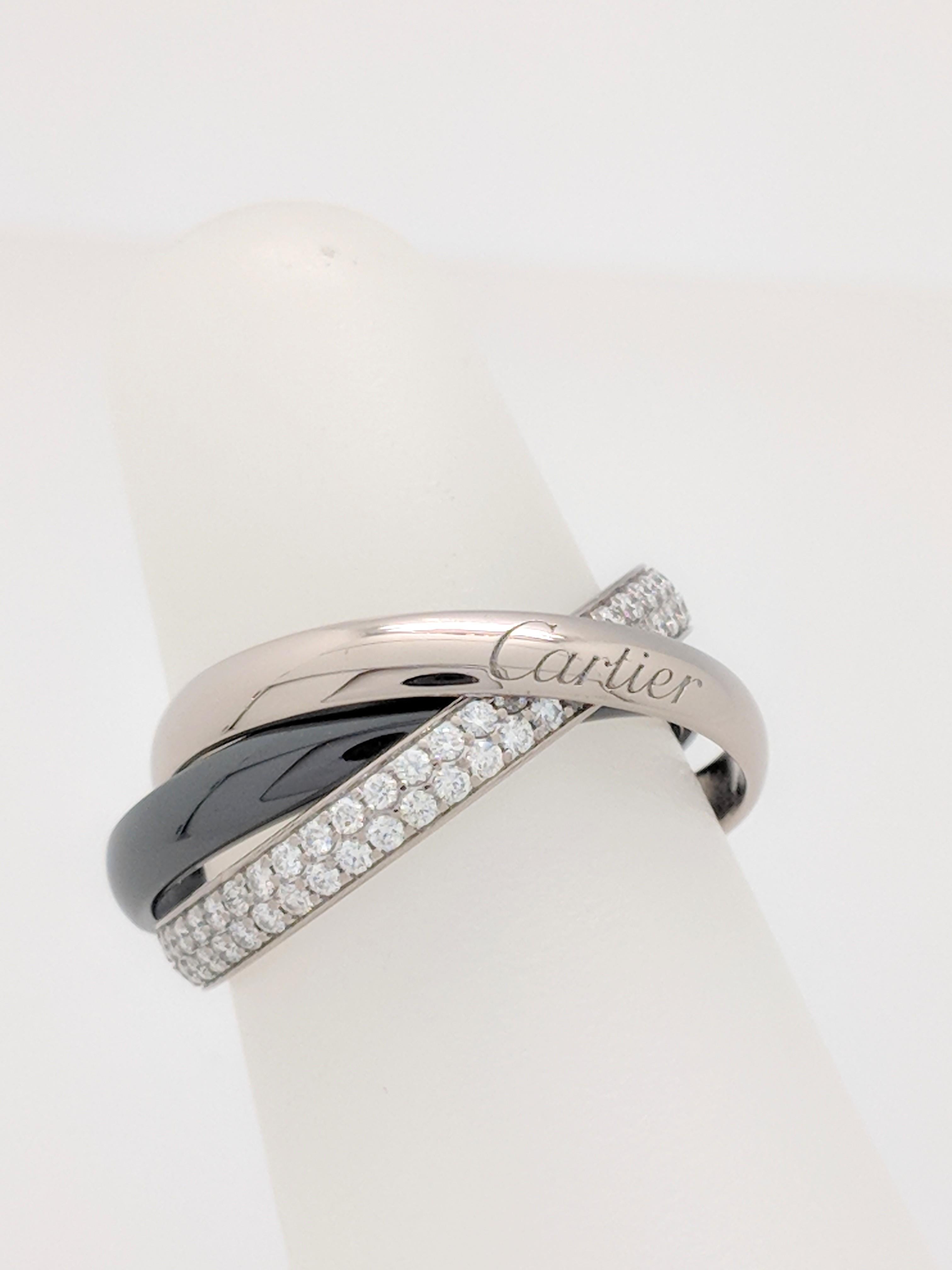 Authentic Cartier Trinity De Cartier Diamond, White Gold and Ceramic Ring 52 (US 6)

You are viewing an Authentic Cartier Trinity Diamond, White Gold and Ceramic Ring. Trinity ring, small model, 18K white gold, black ceramic, set with 100