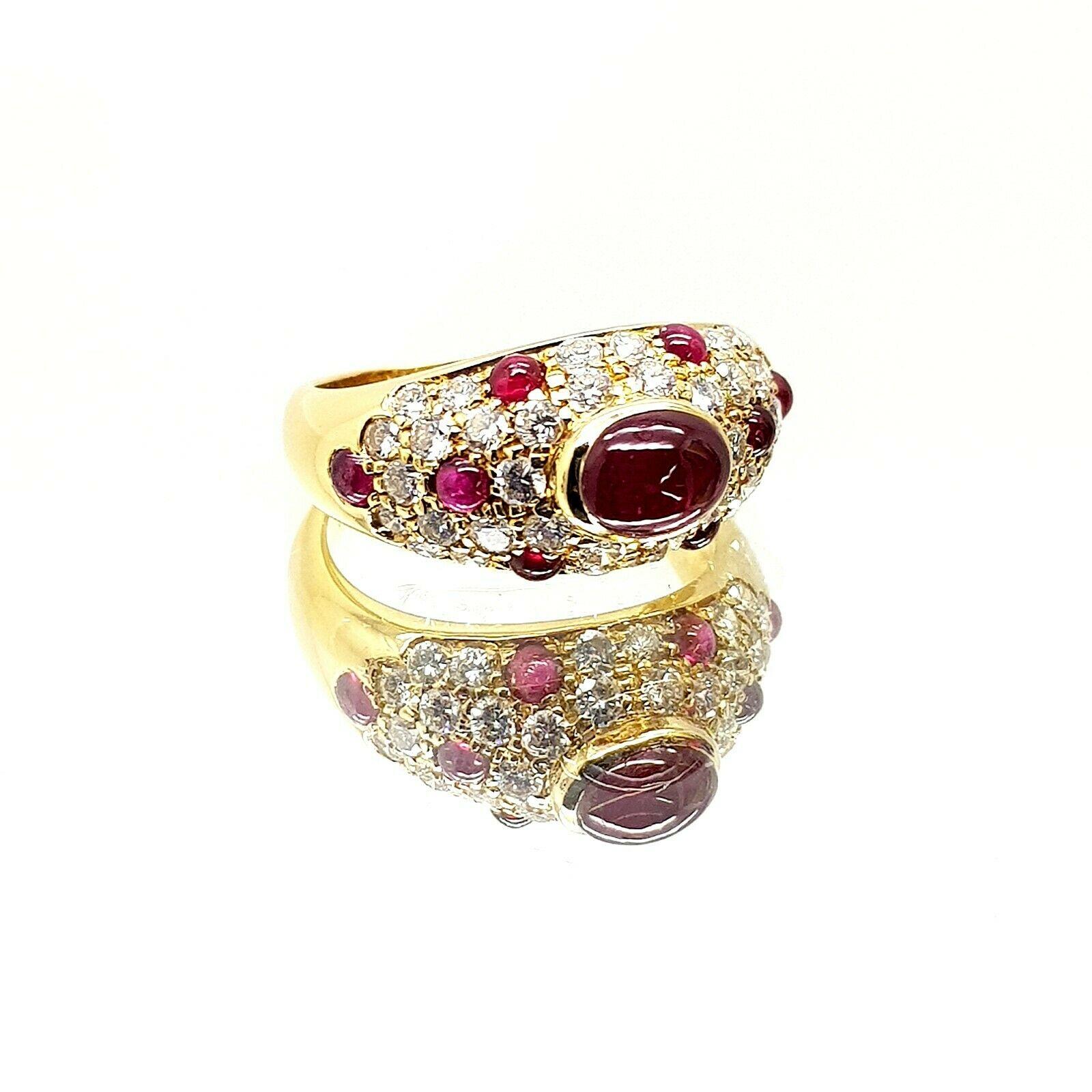  Authentic Cartier vintage cabochon ruby and diamond ring, this ring has 9 pieces of ruby and 37 pieces of round cut diamonds in approximately 0.70 carat total weight, H color and VS1 in clarity. 
Specifications:
    main stone: CABOCHON RUBY 9 pcs
