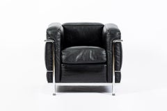 Authentic Cassina LC2 Black Leather Petit Lounge Chair by Le Corbusier, 4x Avail