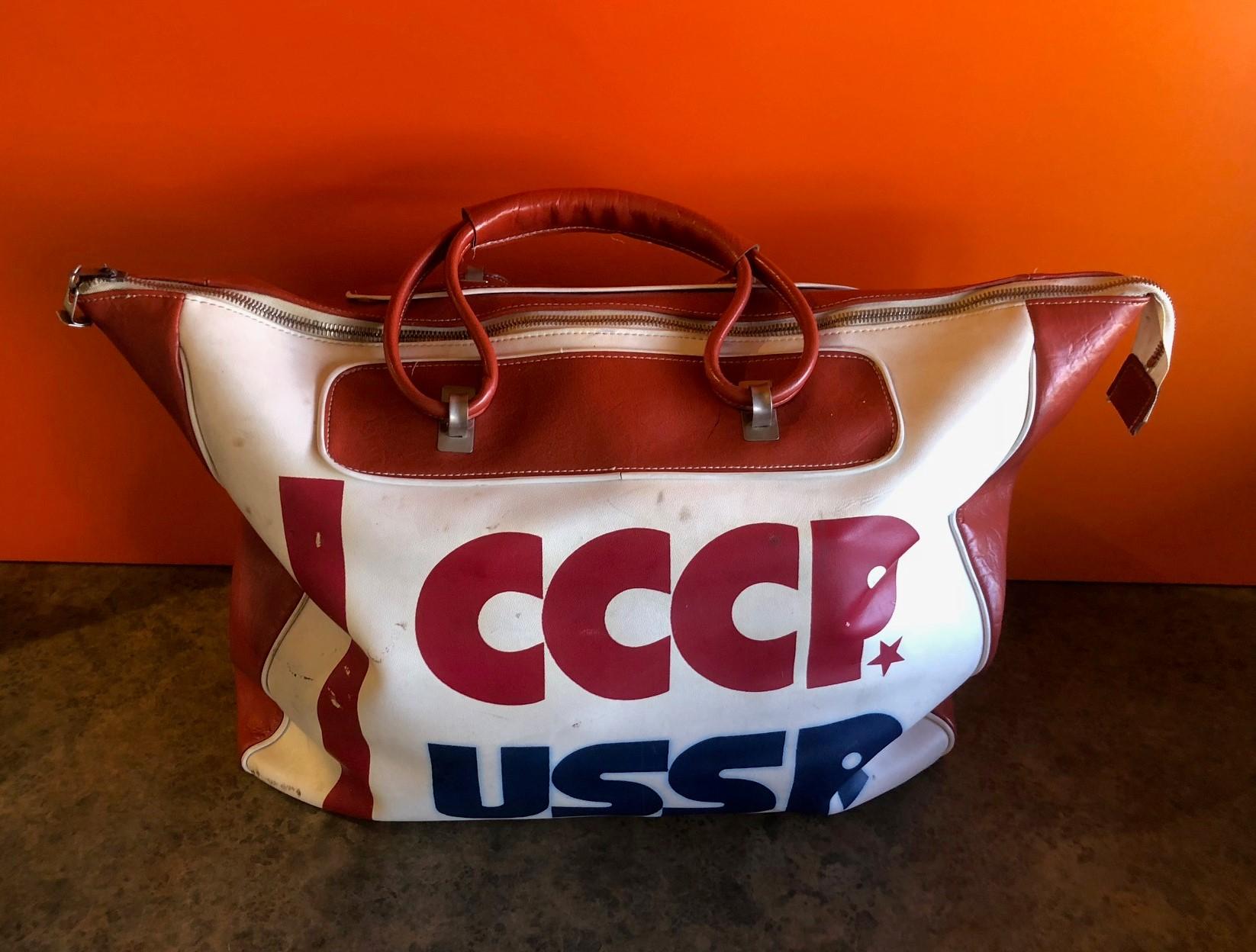 Authentic CCCP USSR Olympic (believed to be Winter 1984) Naugahyde sports bag, circa 1980s

The bag is large and authentic with the original Russian label intact. The piece is believed to be designed by Adidas for the 1984 games in Sarajevo?,