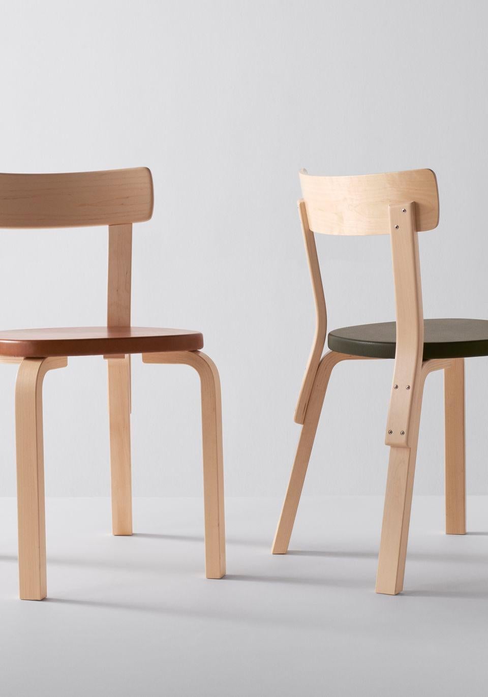 Authentic Chair 69 in birch by Alvar Aalto & Artek. Chair 69 is one of Artek’s most popular chairs, a universal wooden chair in the tradition of classic kitchen and café chairs. With a broad seat and supportive backrest, Chair 69 exudes durability