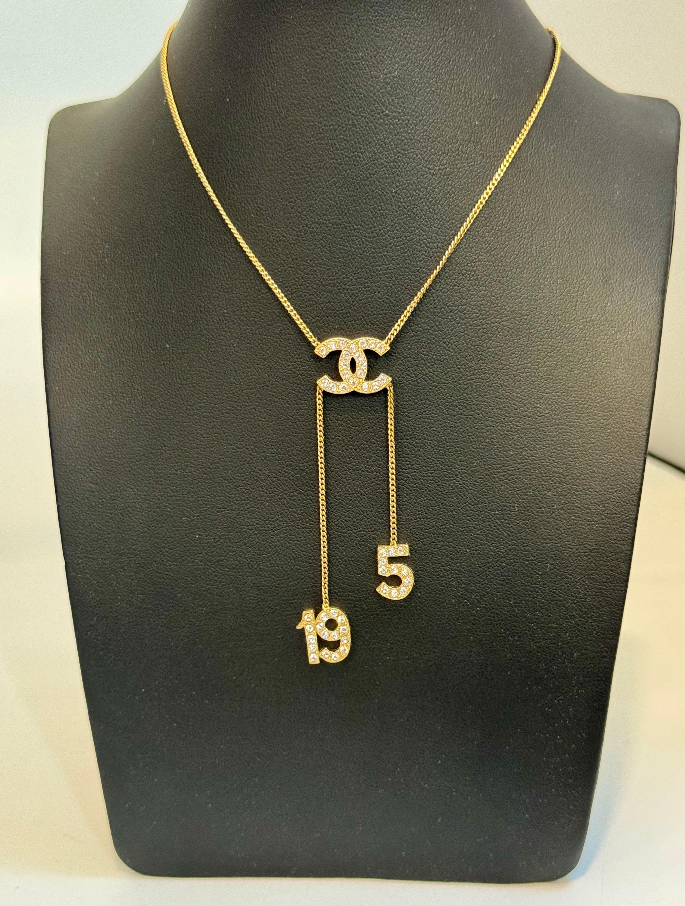 Authentic CHANEL Rhinestone CC LOGO 5 & 19 Pendant Necklace Vintage, Estate For Sale 4