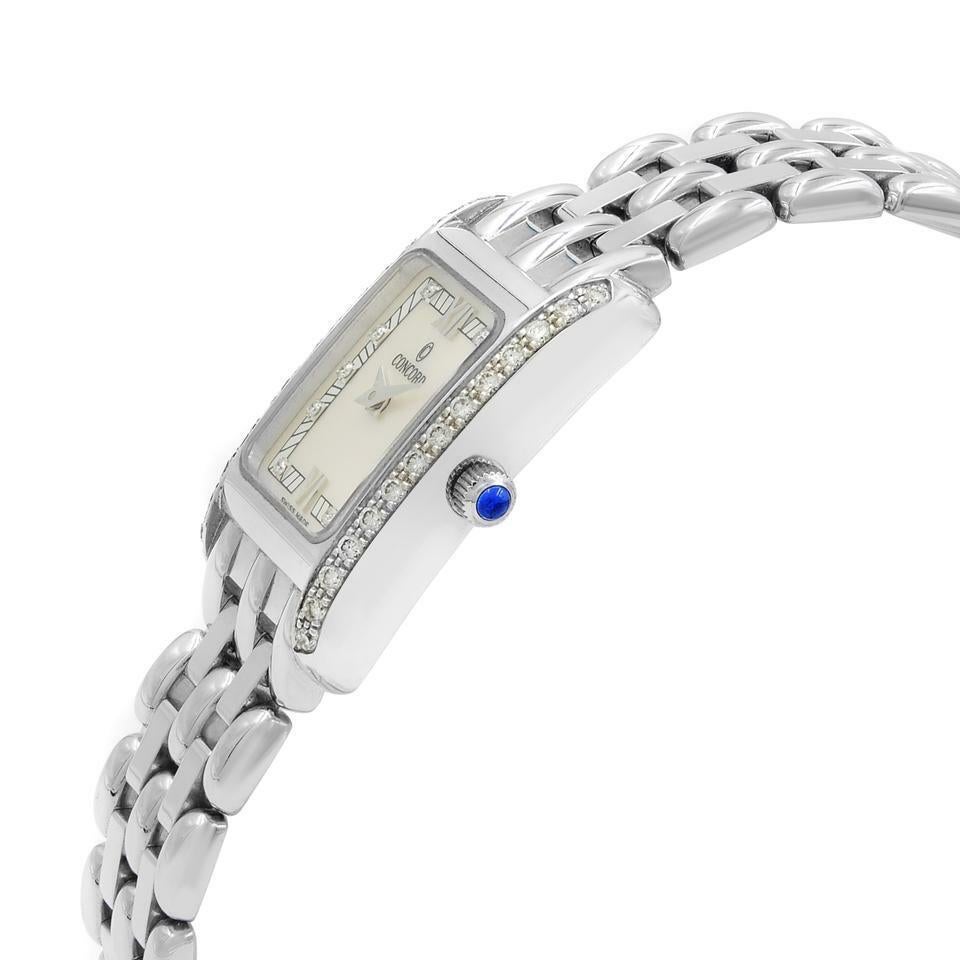 Authentic Concord Veneto Ladies white gold, diamond and mother of pearl dial watch. 

This luxurious, estate Concord Veneto 61-25-680 is a stunning Ladies timepiece. It is cased in 18k white gold adored with 28 round brilliant cut diamonds, with