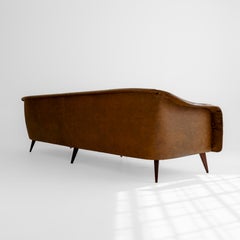 Canapé « Curva » authentique à quatre places, conçu par Joaquim Tenreiro, en bois massif, Brésil, années 1960