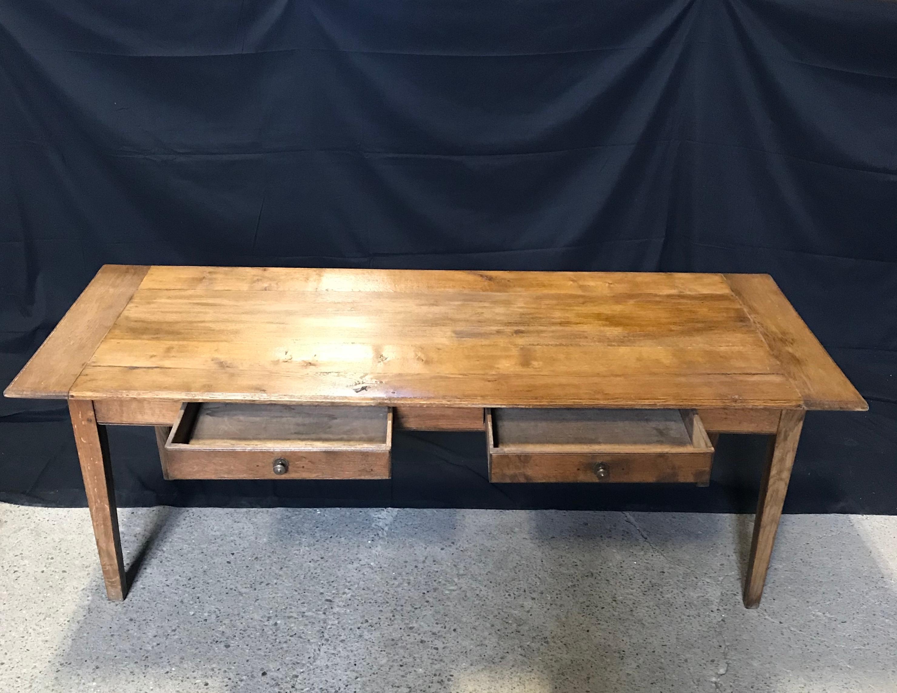 Hard to find authentic and elegant French Provincial farmhouse table with two drawers and tapered legs.
Measures: H skirt 24.5