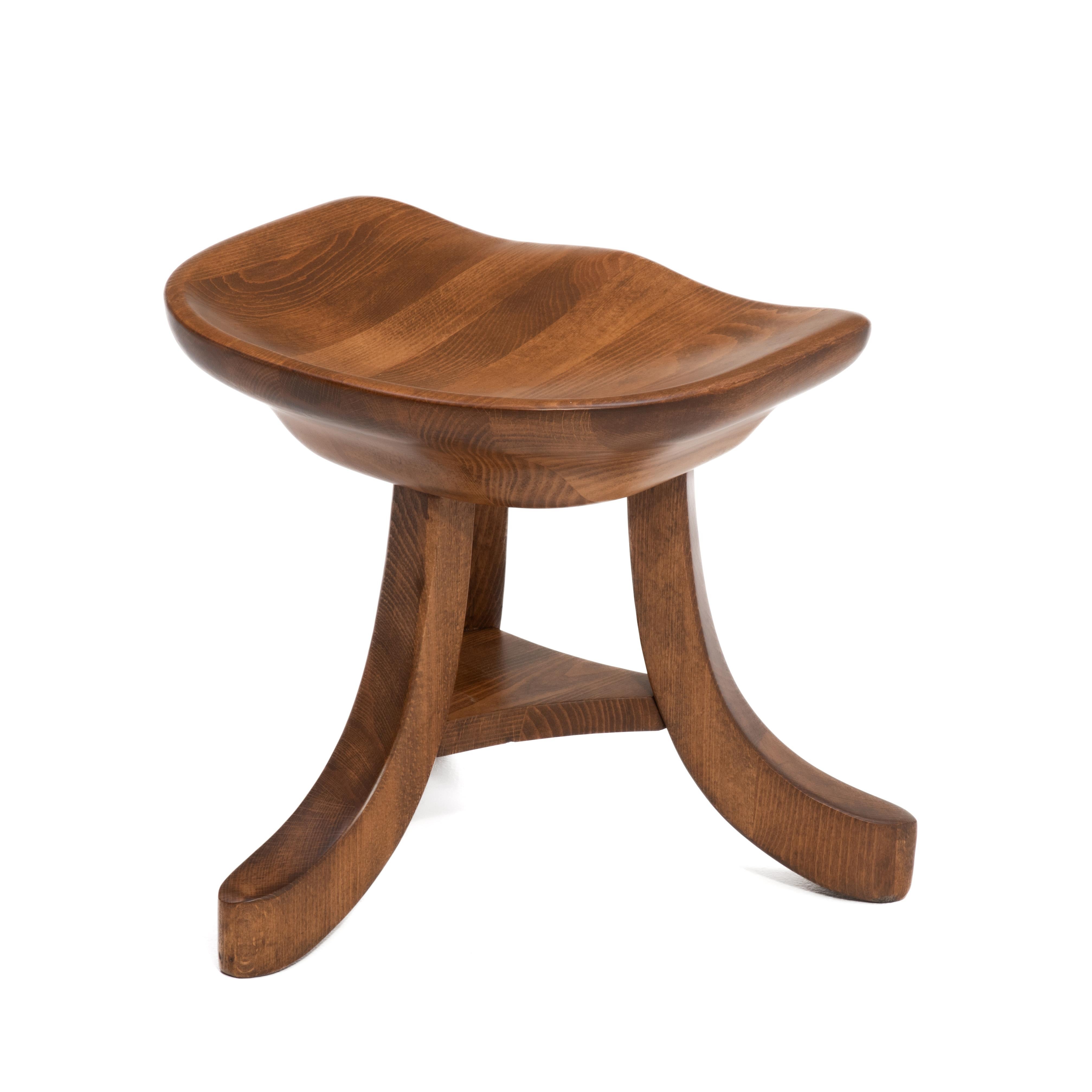 An Authentic Furniture Products milking stool. Made in Japan, this stool is designed after the  Smith & Watson Park Avenue Milking Stool, or maybe vice versa... The seat is actually 14 1/2