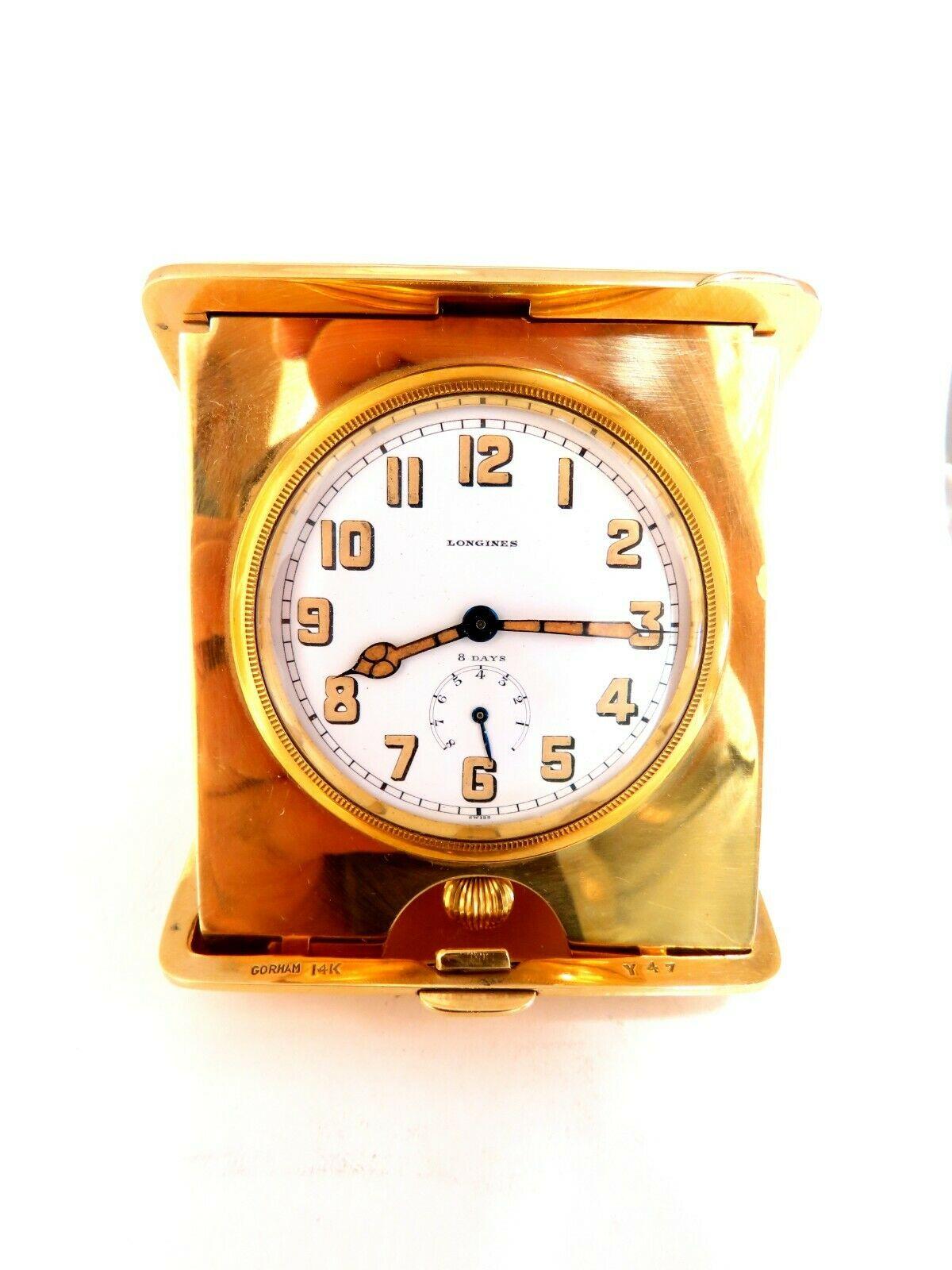 Gorham for Longines

8 Day Power Reserve Portable Desk Clock

Will Fit to pocket, 8 Day winding

Working and tested

Case has been designed by Gorham

14kt. Yellow gold 

248 grams.

3.3 x 2.9 inch
Depth: .9 inch
56mm dial


Please see engraving on