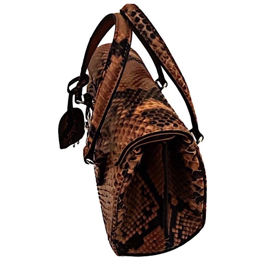 Authentic Gucci 14 FW Frida Giannini Runway Python Lady Lock Handbag 
Includes Gucci Dustbag, Keys
Made in Italy 

Python Exterior, Suede Interior, Silver Plated Hardware 

Two Interior Pockets 

6”H
9”L
4”W