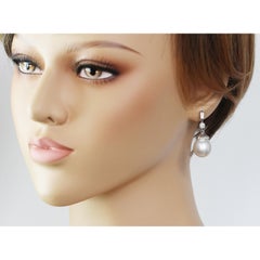 Authentic Gucci 18 Karat White Gold Diamonds and South Sea Pearl Earrings