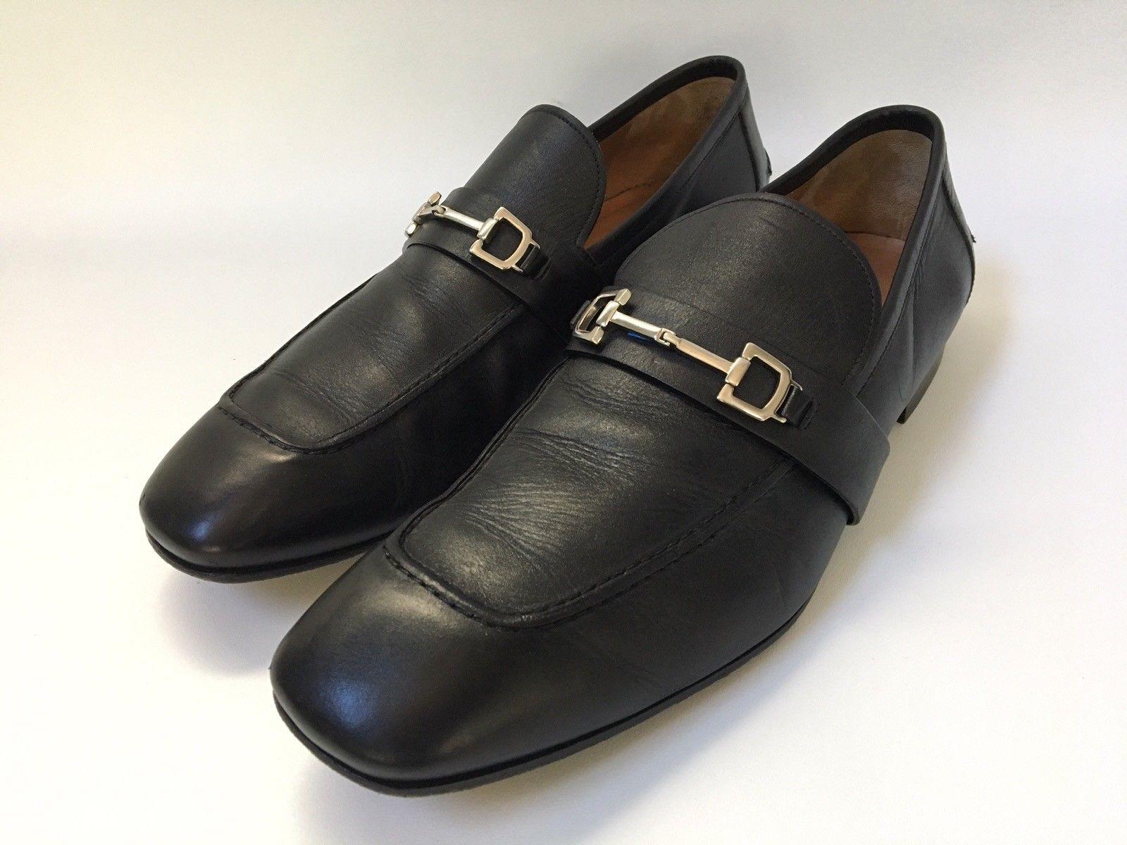 Men’s Gucci Horsebit Loafers in black leather with silver hardware.  US size 11.5 (Euro 44/45) in medium width.  Uppers and lowers of shoes in very good condition.