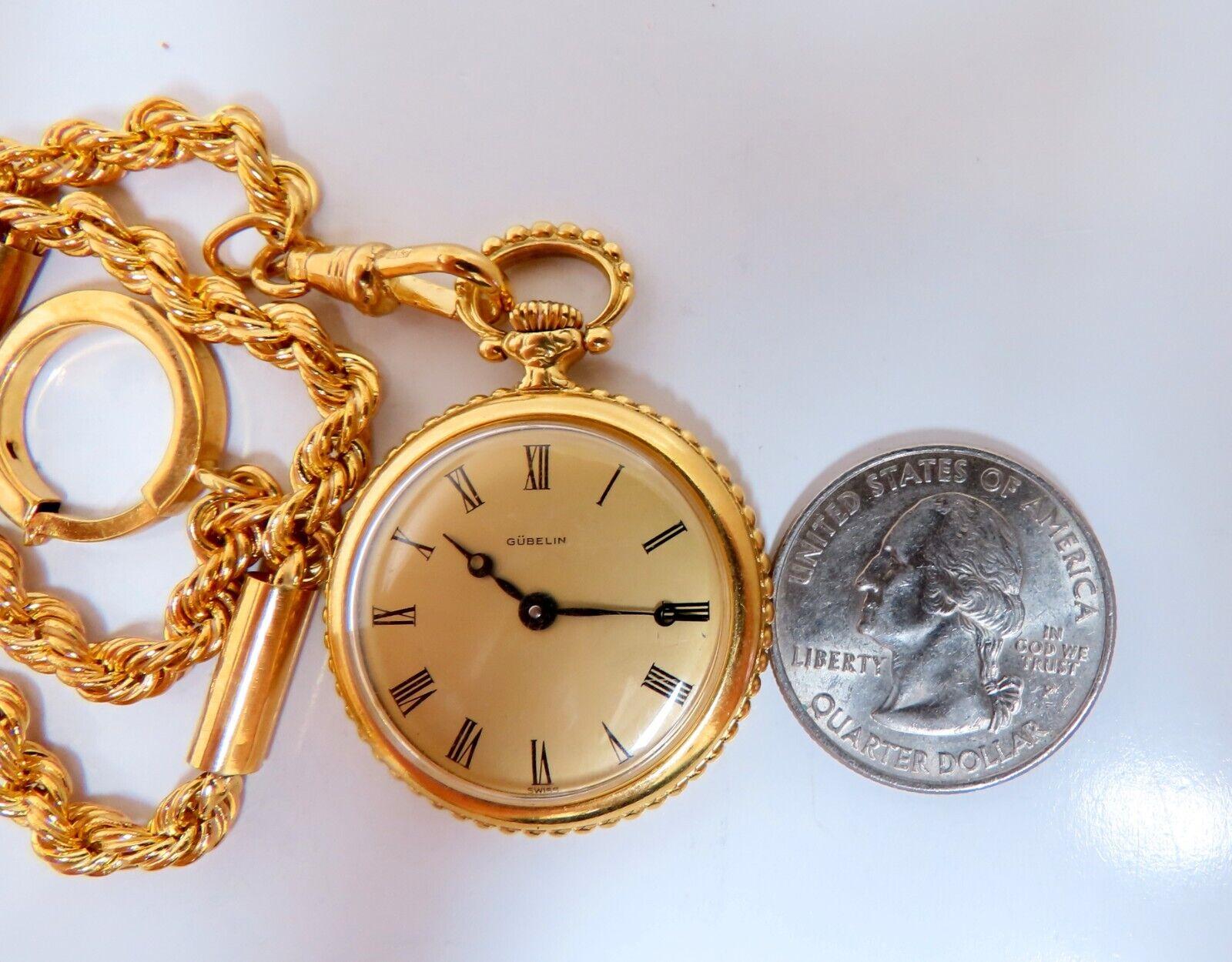 Gueblin 

Winding pocket watch


Working and tested

14kt. Yellow gold 

31.5 grams.

30mm diameter

Total Length 12 inches

4mm caliber chain

