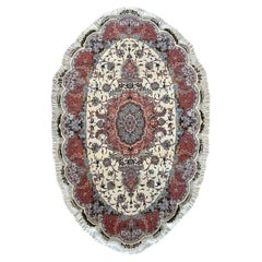 Authentique tapis persan Tabriz ovale noué à la main