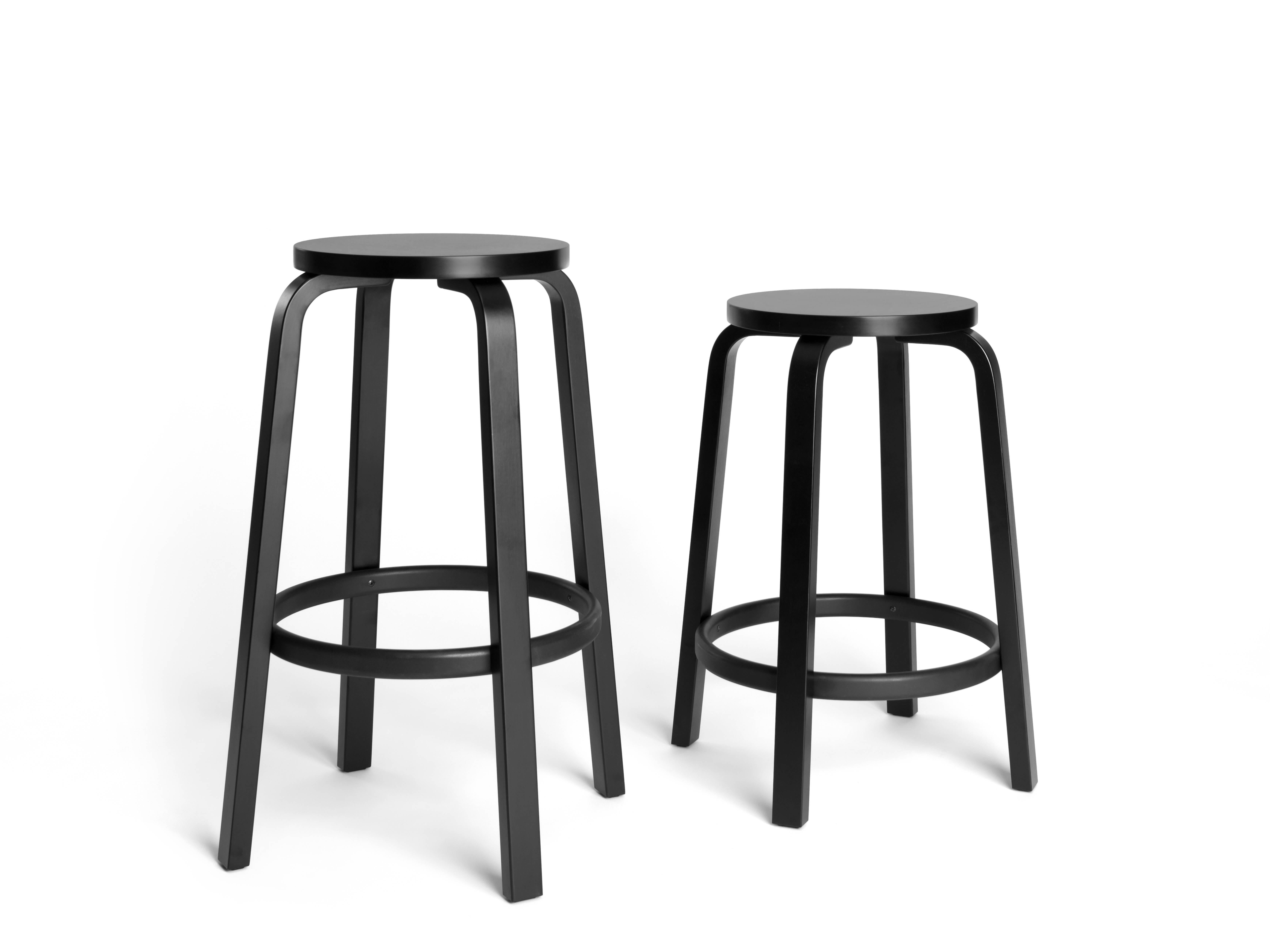 Taller in stature, this stool features a natural birch frame and can come accented by a laminate or linoleum seat surface. Perfect for high top tables and bar counters, the stool also features a sturdy birch rail footrest for added comfort without